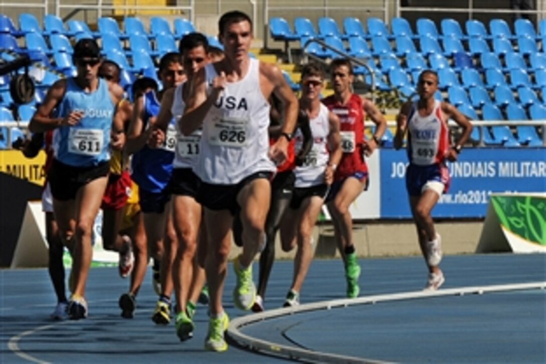 U.S. Army Maj. Dan Browne, World Class Athlete Program distance runner, leads the way in the second semifinal heat of the men's 10,000-meter run at the 5th CISM Military World Games at Olympic Stadium in Rio de Janeiro, July 20, 2011. Browne finished ninth with a time of 31 minutes, 7.16 seconds, and advanced to the final. 