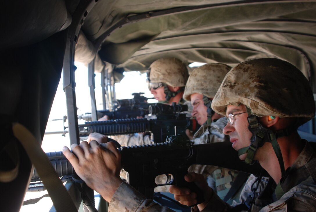 Lance Cpl. Jarrod N. Whoric, a mechanic with Detachment A, Marine Wing Support Squadron 471, Marine Wing Support Group 47, 4th Marine Aircraft Wing, sites in on targets with other Marines with his unit during a convoy live fire training exercise Thursday, July 21 at a range and proving ground near Marine Corps Air Station Yuma, Ariz. The motor transportation operators are also taking part in the exercise Javelin Thrust 2011.