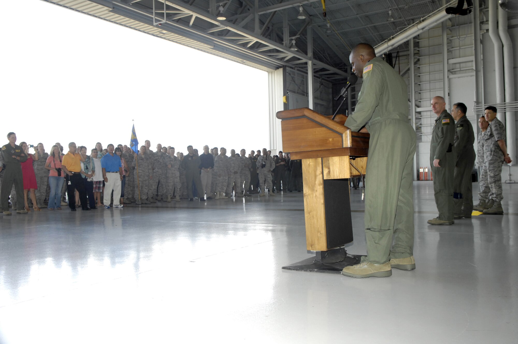 Lt. Col. Brian Hill, 96th Air Refueling Squadron commander, speaks at the July 22 send-off ceremony for the Team Hickam Rodeo 2011 Team at Hangar 19 on Joint Base Pearl Harbor-Hickam, Hawaii. The team is traveling to Joint Base Lewis-McChord, Wash., to compete in the Air Mobility Rodeo 2011. This competition focuses on improving worldwide air mobility forces' professional core abilities. (U.S. Air Force Photo/David D. Underwood, Jr.)
