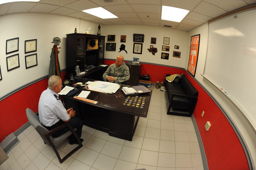 Chaplain (Capt.) Richard Holmes, a member of the 2nd Bomb Wing Chaplain Corps, meets with Senior Master Sgt. Jay Wagner, 2nd Aircraft Maintenance Squadron first sergeant, on Barksdale Air Force Base, La., July 18. Holmes meets with first sergeants and commanders to collaborate on how to better meet the needs of Barksdale's Airmen. (U.S. Air Force photo/Airman 1st Class Micaiah Anthony)(RELEASED)