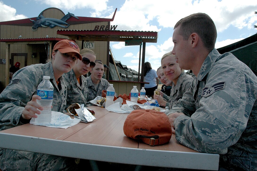The Reserve's 446th Airlift Wing's aerial port team for Rodeo 2011 enjoys lunch at the wing's tent at Rainier Ranch July 22.  Air Mobility Rodeo is July 24-29 at McChord Field, Wash. (U.S. Air Force photo by Sandra Pishner)