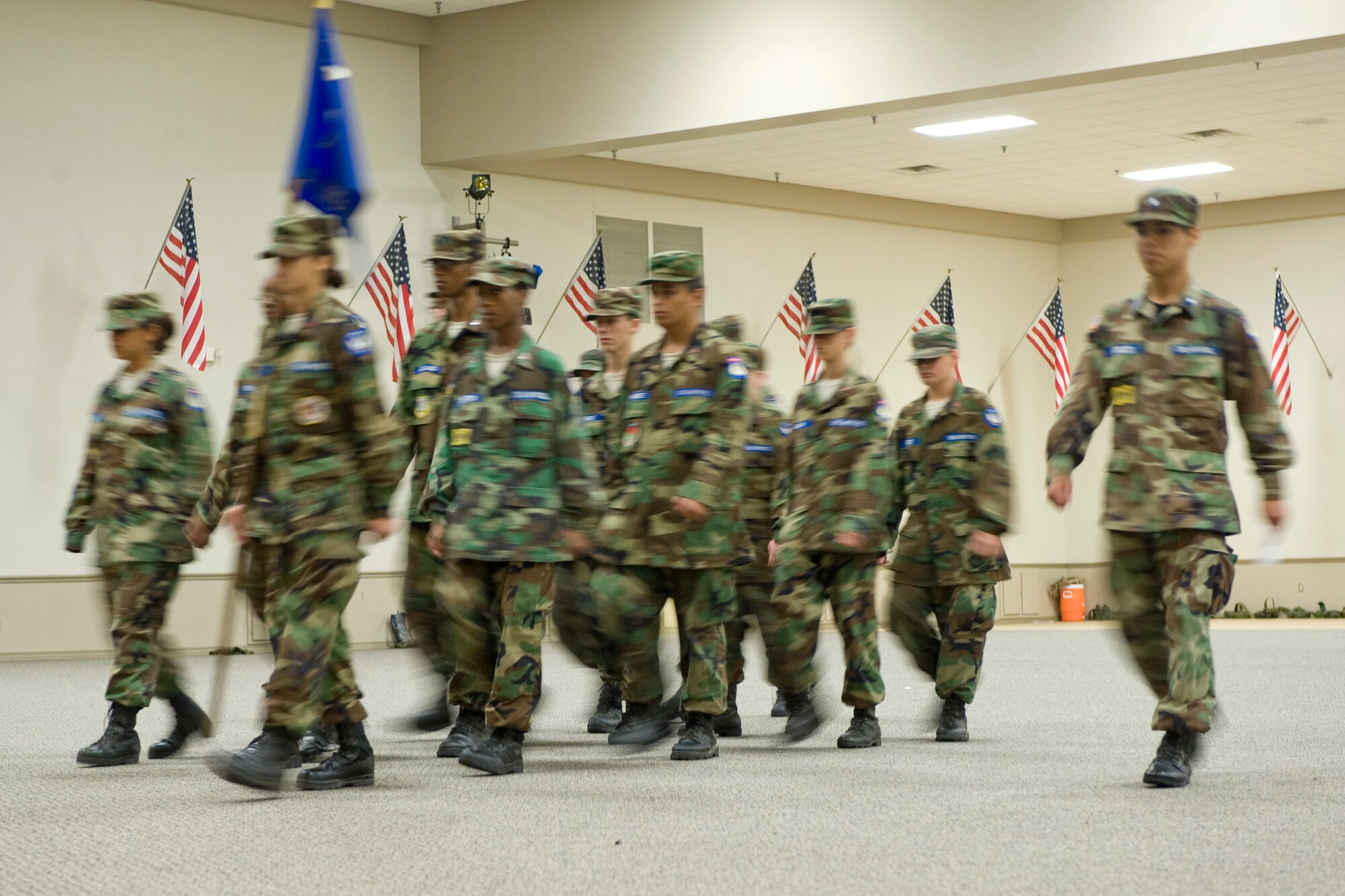 Cadets with the Louisiana Civil Air Patrol Cadet Encampment march during a drill competition in Hoban Hall on Barksdale Air Force Base, La., July 22. Four separate flights of cadets participated, completing a series of drill movements that were judged by members of the base honor guard. (U.S. Air Force photo/Senior Airman Chad Warren) (RELEASED)