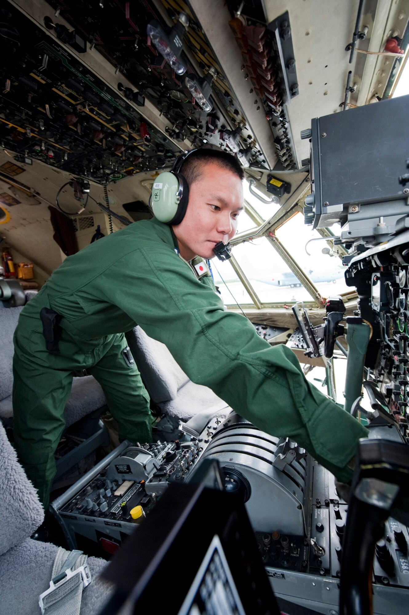 JOINT BASE ELMENDORF-RICHARDSON, Alaska ???- A member of the Japan Air Self-Defense Force does a pre-flight inspection of a C-130 Hercules at Joint Base Elmendorf-Richardson, Monday, during Red Flag-Alaska 11-2.  (U.S. Air Force photo/Senior Airman Christopher Gross)