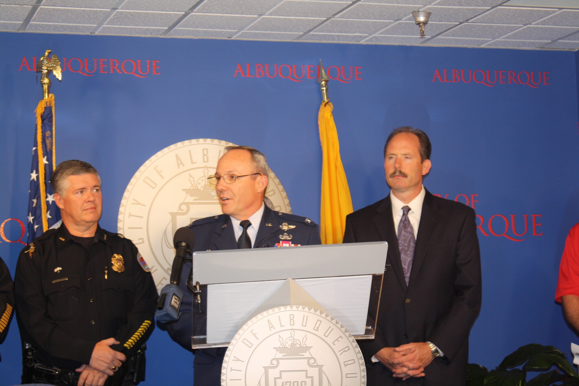 Albuquerque Police Chief Ray Schultz, left, Col. Robert L. Maness, 377th Air Base Wing commander, center, and Albuquerque Mayor Richard Berry, left, speak to the
media July 15 about the upcoming 9/11 remembrance ceremony and the Stephen Siller “Tunnel to Tower” 5K run.

Courtesy Photo