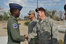 Below, Capt. Luke Bates, 342nd Training Squadron Det 1 commander, right, and Lt. Col. Jerry Kung, 342 TRS commander, greet Gen. Edward A. Rice Jr., AETC commander, during his visit to the Guardian Angel Training Complex.

Photo by Todd Berenger