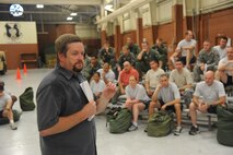 Kevin Spears briefs members of the exercise evaluation team on what events they would go through during their hour of training at Moody Air Force Base, Ga., July 22, 2011. Spears later broke the team into four groups consisting of different training exercises involving mission-oriented protective posture gear. (U.S. Air Force photo by Airman 1st Class Paul Francis/Released)
