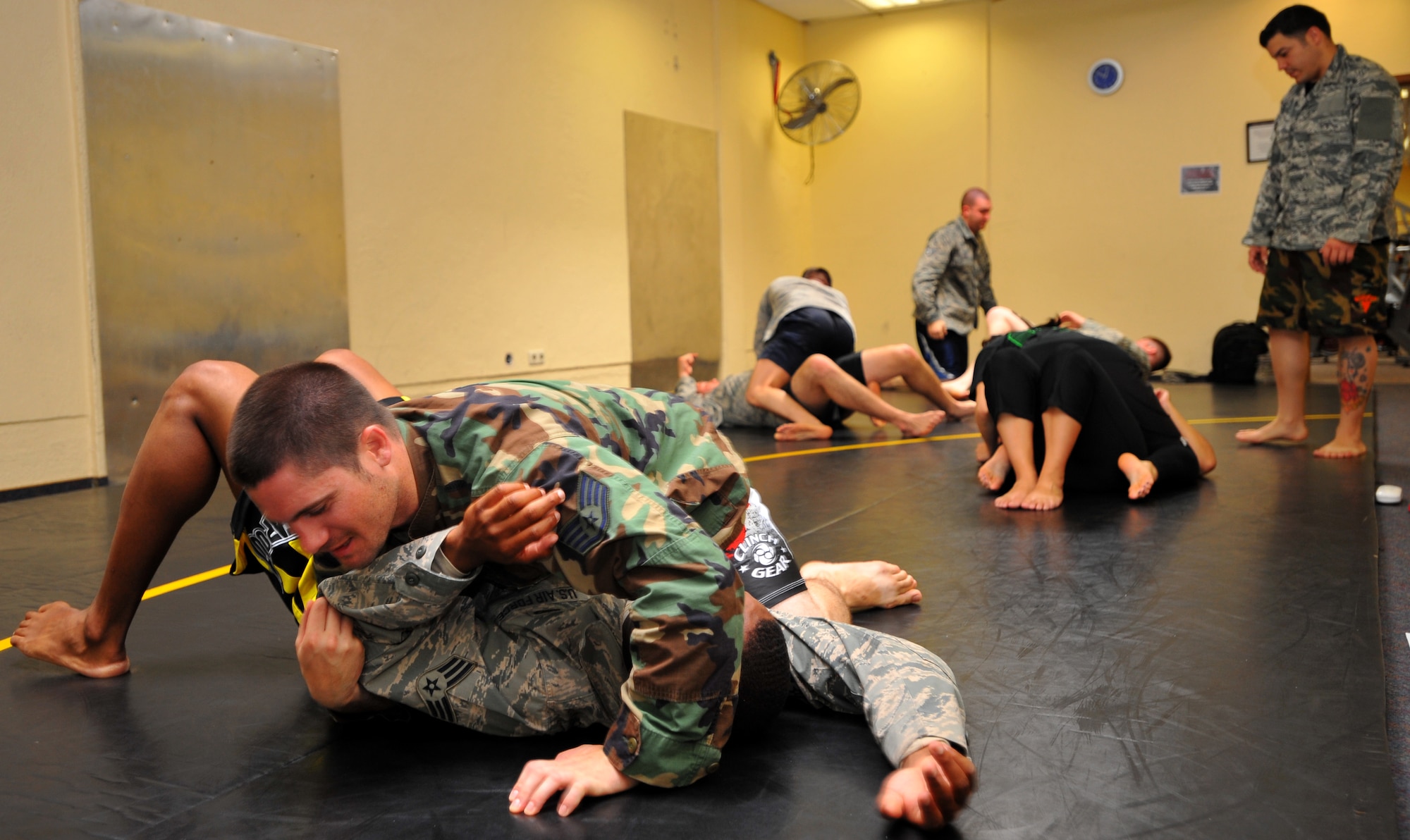 SPANGDAHLEM AIR BASE, Germany – Spangdahlem Airmen practice mixed martial arts during a combatives training class at the Skelton Memorial Fitness Center here July 19. Combatives classes last five days and are free for active-duty military and family members 18 years and older. (U.S Air Force photo/Airman 1st Class Dillon Davis)