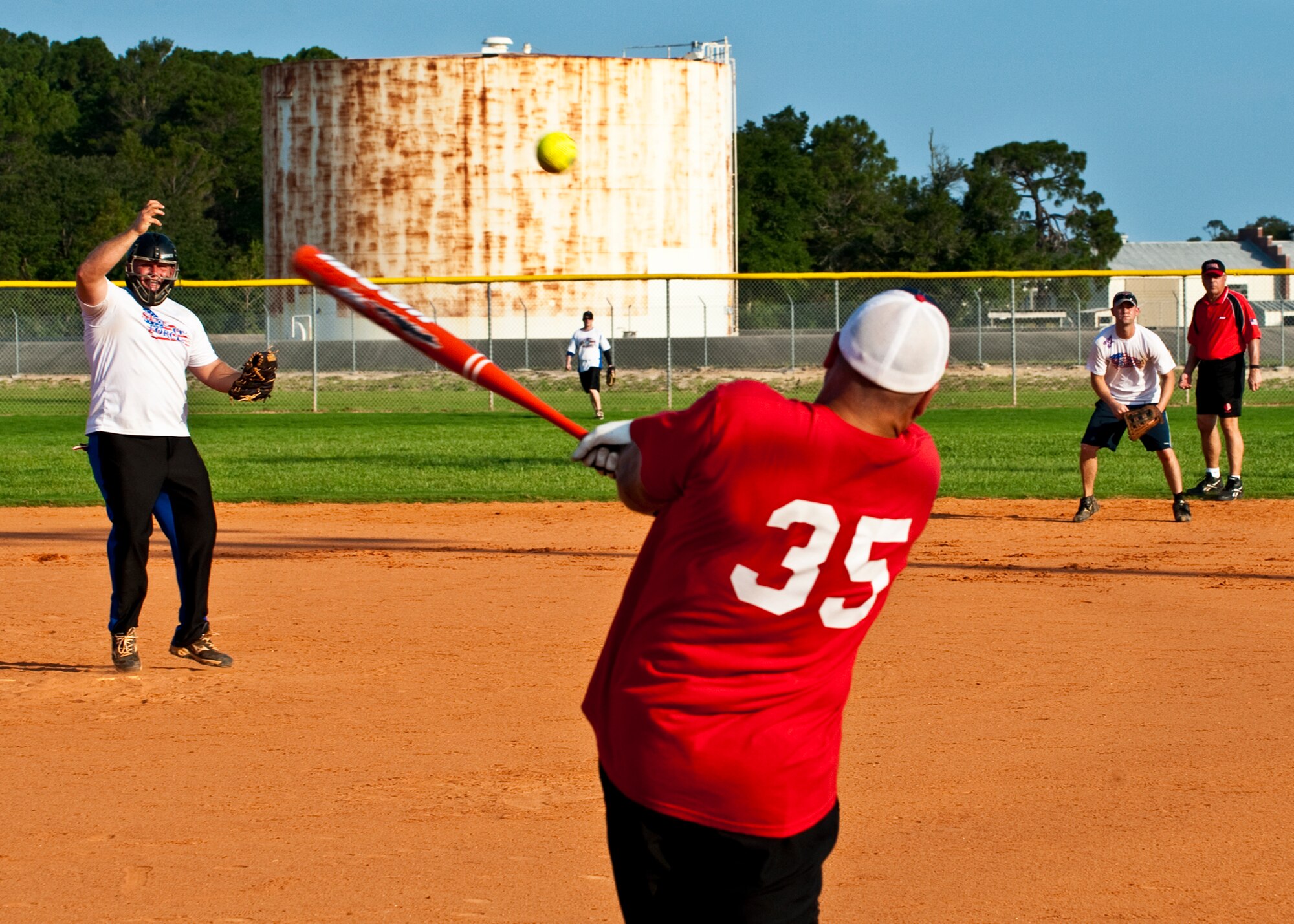 Jeff Milam, of the 96th Medical Group, gets a hit during the intramural softball championship game against the 96th Security Forces Squadron at Eglin Air Force Base, Fla., July 20.  SFS came from behind in the final inning to take the championship 16-15.  (U.S. Air Force photo/Samuel King Jr.)
