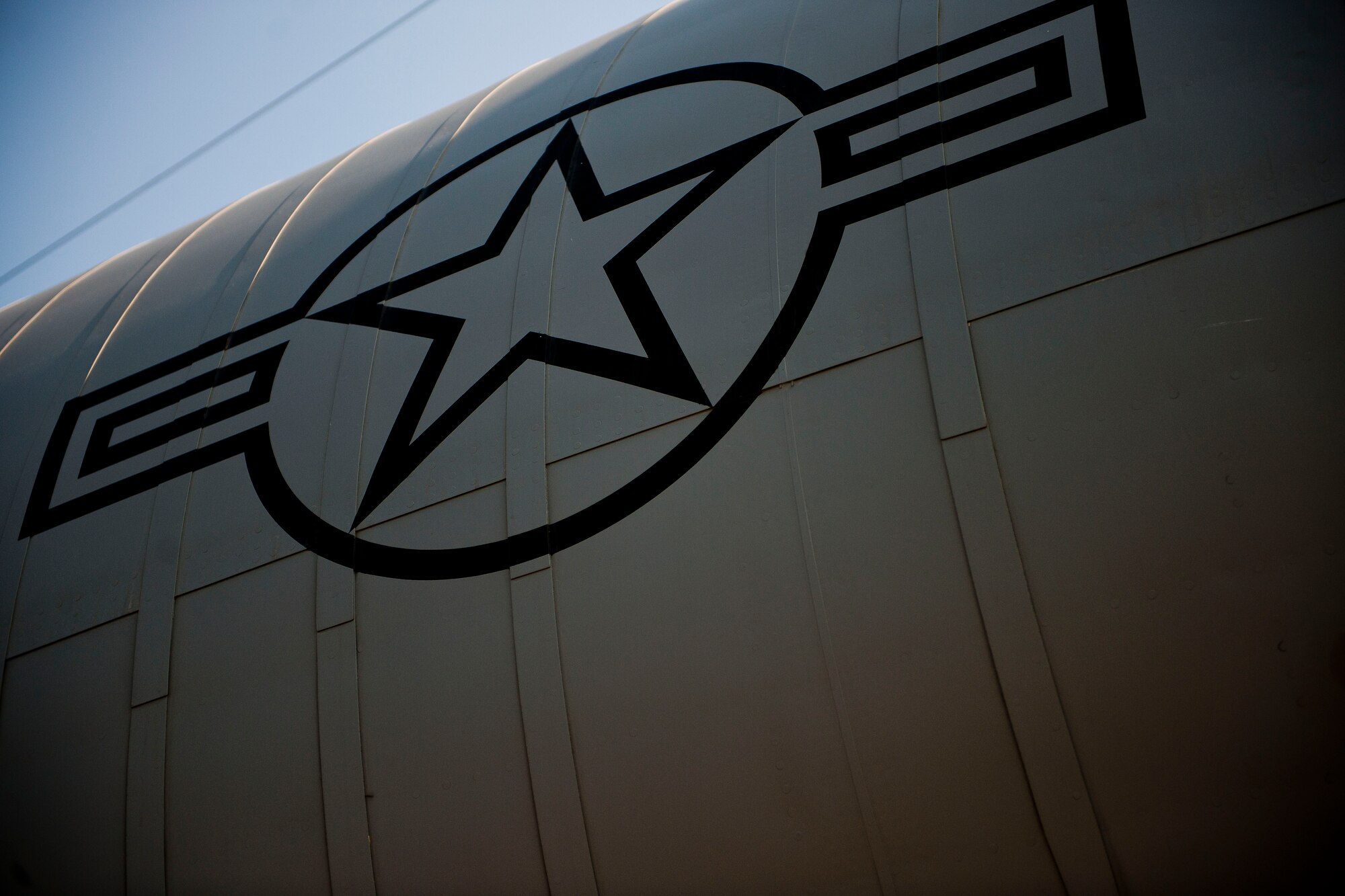 The U.S. Air Force roundel, an aircraft's country identifier, is displayed on the side of a KC-135R Stratotanker aircraft from the 90th Air Refueling Squadron July 20, 2011, at Incirlik Air Base, Turkey. The 90th EARS, a total-force team consisting of nearly 100 active-duty, Reserve and Air National Guard Airmen, conducts air-to-air refuels to C-17 Globemaster IIIs and C-5 Galaxies coming in and out of the area of operations. (U.S. Air Force photo by Tech. Sgt. Michael B. Keller/Released)