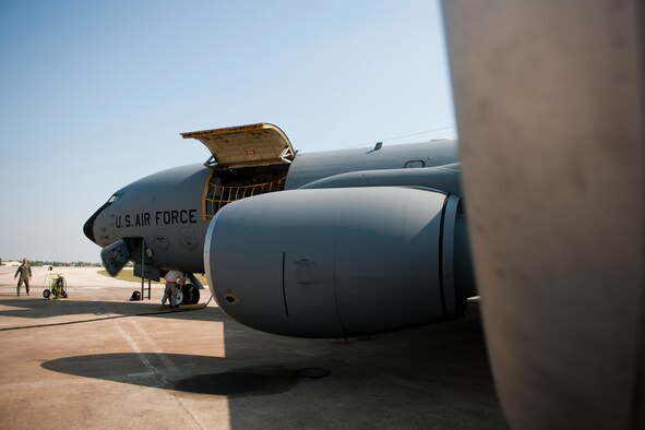 Maj. Trey Forrest, left, and Tech. Sgt. Michael Dymnioski, from the 90th Expeditionary Air Refueling Squadron, inspect a KC-135R Stratotanker aircraft before a flight July 20, 2011, at Incirlik Air Base, Turkey. The 90th EARS, a total-force team consisting of nearly 100 active-duty, Reserve and Air National Guard Airmen, conducts air-to-air refuels to C-17 Globemaster IIIs and C-5 Galaxies coming in and out of the area of operations. (U.S. Air Force photo by Tech. Sgt. Michael B. Keller/Released)