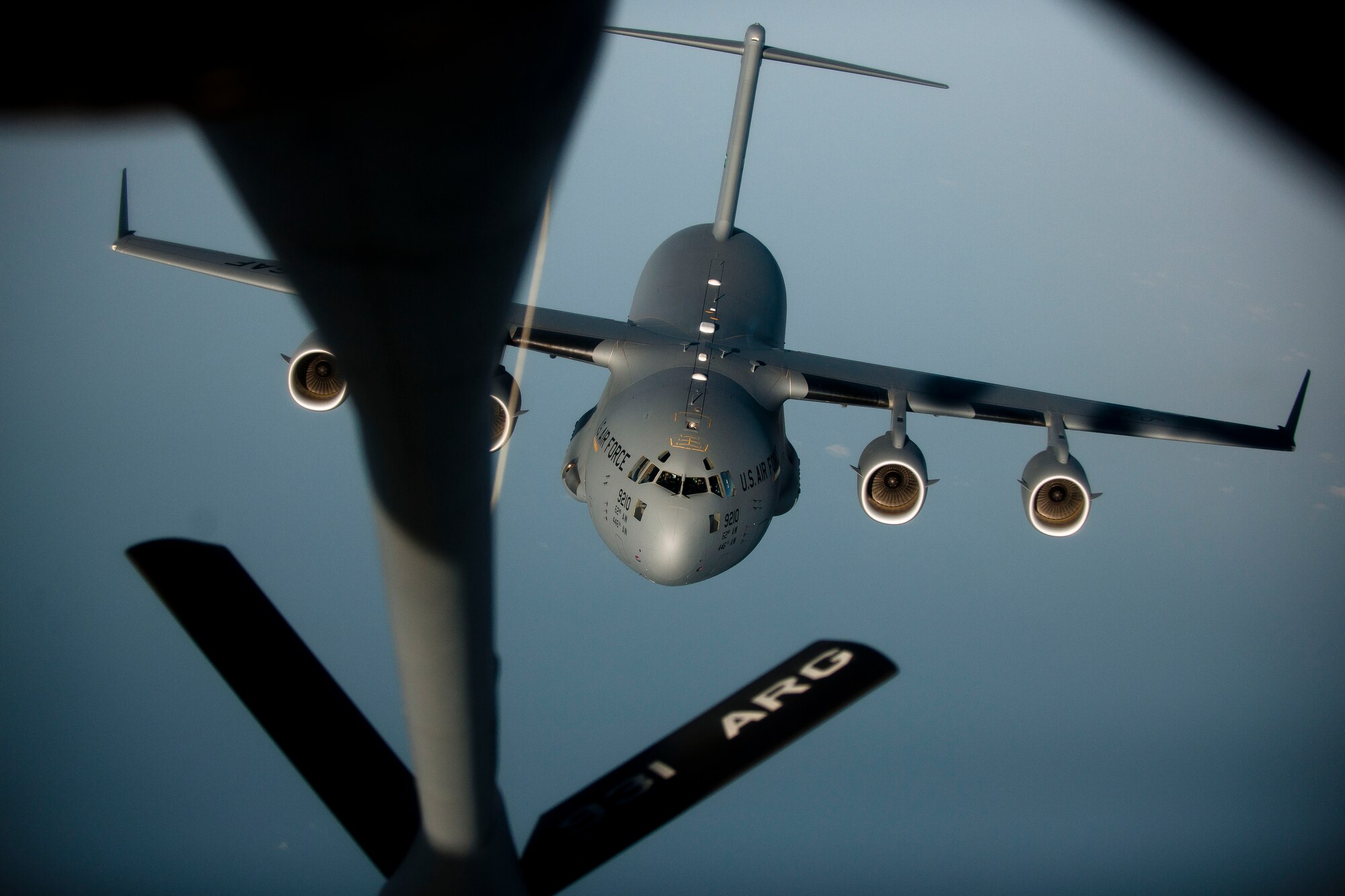 A C-17 Globemaster III aircraft approaches a 90th Expeditionary Air Refueling Squadron KC-135R Stratotanker aircraft during an air refueling training mission July 20, 2011, over the Black Sea north of Turkey. The 90th EARS, a total-force team consisting of nearly 100 active-duty, Reserve and Air National Guard Airmen, conducts air-to-air refuels to C-17 Globemaster IIIs and C-5 Galaxies coming in and out of the area of operations. (U.S. Air Force photo by Tech. Sgt. Michael B. Keller/Released)