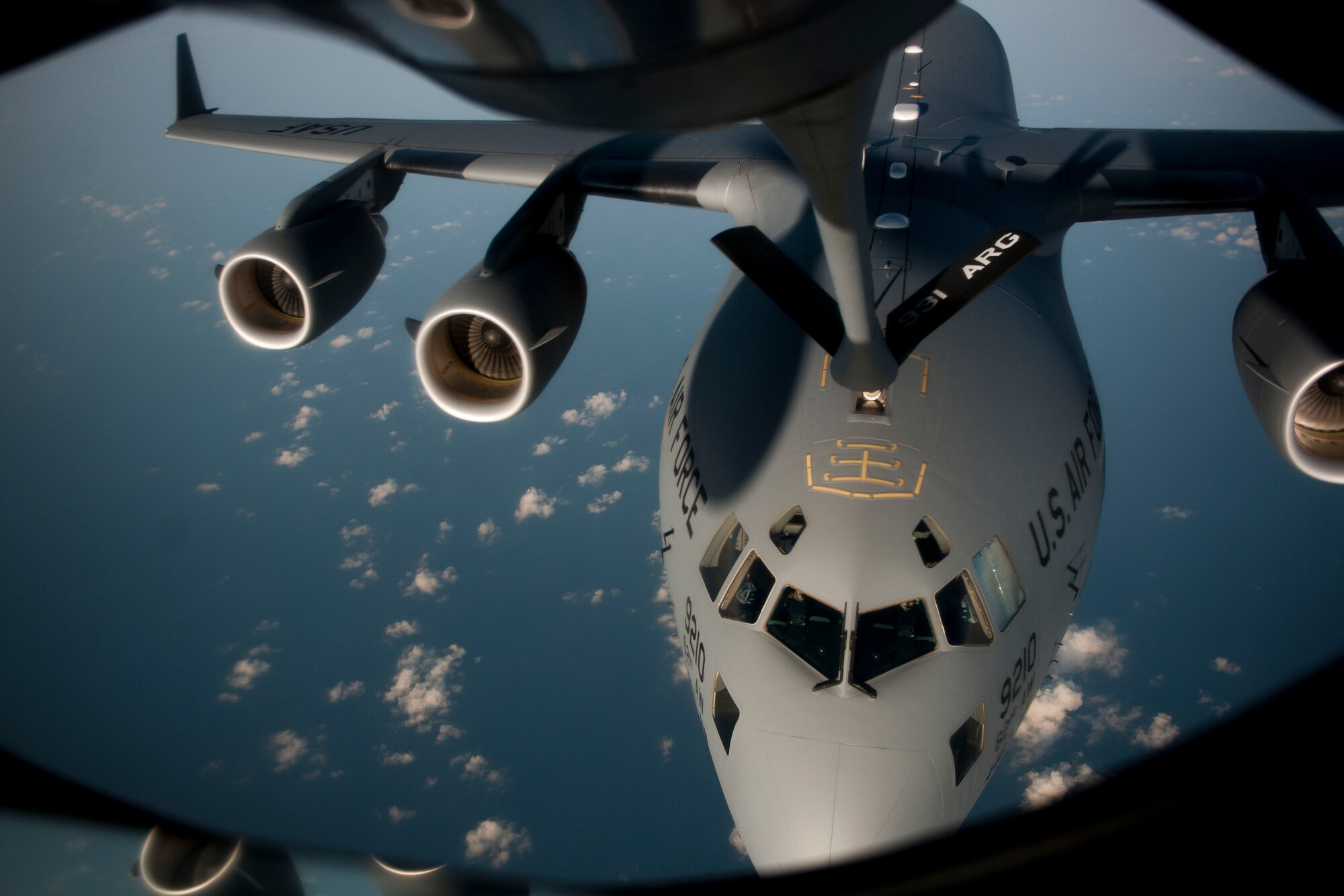 A C-17 Globemaster III aircraft connects to a 90th Expeditionary Air Refueling Squadron KC-135R Stratotanker aircraft during an air refueling training mission July 20, 2011, over the Black Sea north of Turkey. The 90th EARS, a total-force team consisting of nearly 100 active-duty, Reserve and Air National Guard Airmen, conducts air-to-air refuels to C-17 Globemaster IIIs and C-5 Galaxies coming in and out of the area of operations. (U.S. Air Force photo by Tech. Sgt. Michael B. Keller/Released)