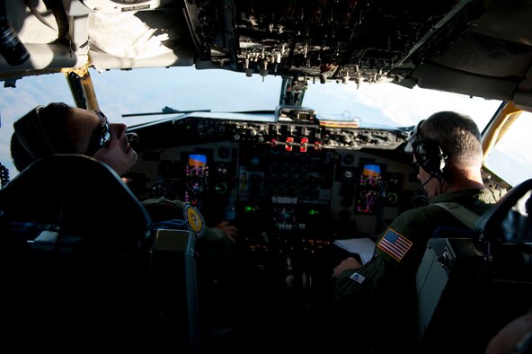 Maj. Trey Forrest, left, and Lt. Col. Barry Jones, 90th Expeditionary Air Refueling Squadron pilots, fly a KC-135R Stratotanker aircraft July 20, 2011, over Turkey. The 90th EARS, a total-force team consisting of nearly 100 active-duty, Reserve and Air National Guard Airmen, conducts air-to-air refuels to C-17 Globemaster IIIs and C-5 Galaxies coming in and out of the area of operations. (U.S. Air Force photo by Tech. Sgt. Michael B. Keller/Released)