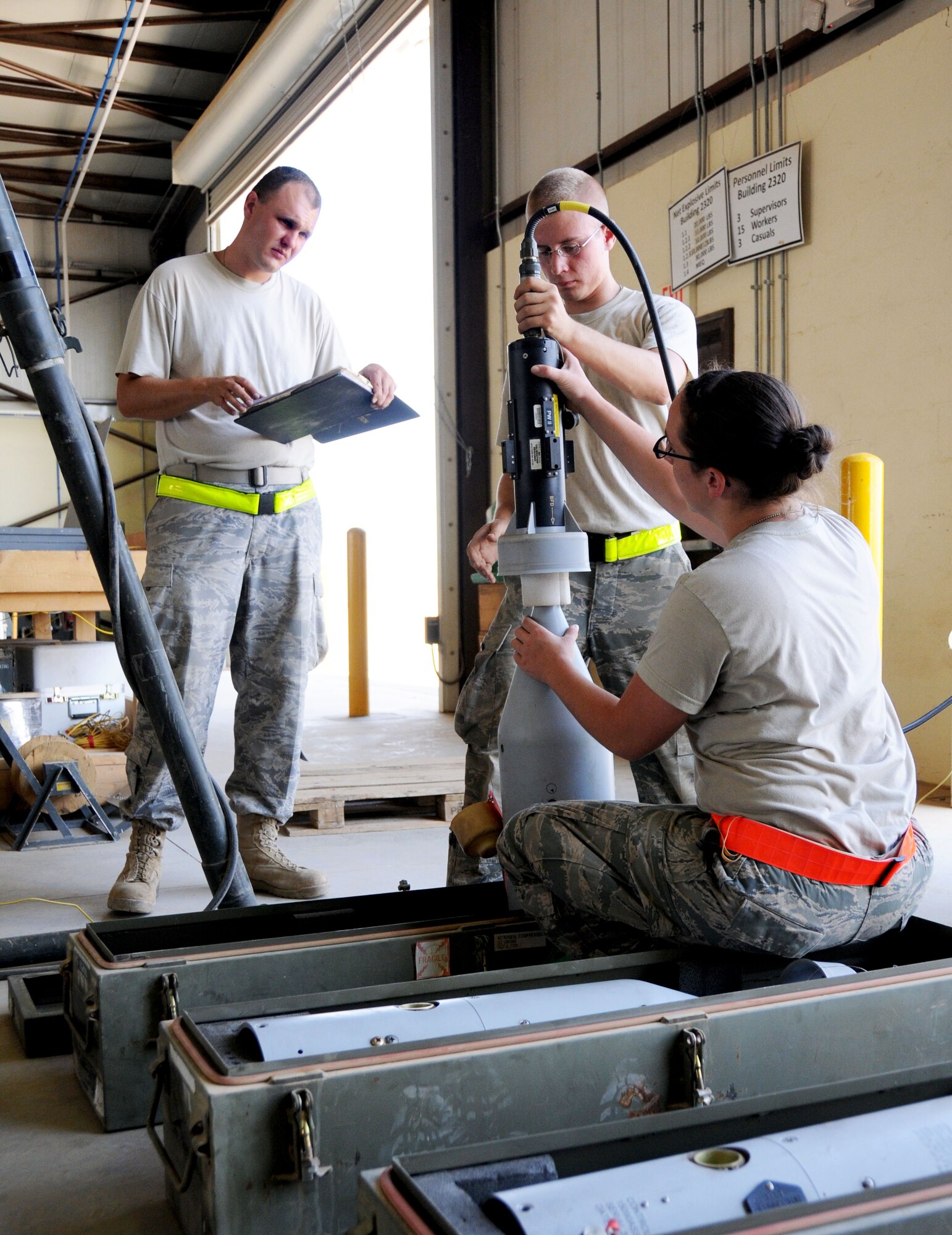 Members of the 332nd Expeditionary Maintenance Squadron deployed from Spangdahlem Air Base, Germany, perform a routine munitions function check. The “Ammo Troops” perform a key component of the flying mission on Joint Base Balad, Iraq, by maintaining and providing F-16 Fighting Falcon Aircraft with proper armament. (U.S. Air Force photo by Senior Airman Jeffrey Schultze)