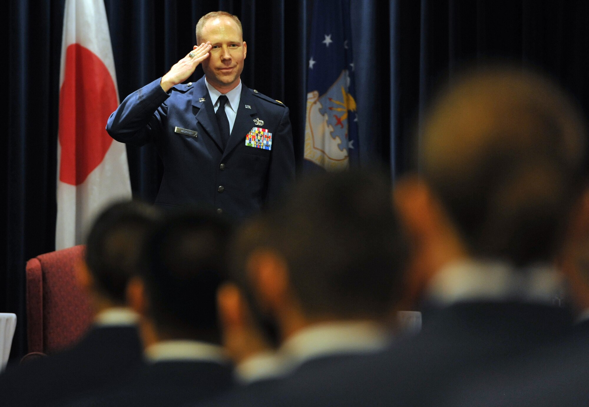 YOKOTA AIR BASE, Japan -- Maj. Brandon Maroon, 374th Logistics Readiness Squadron commander, renders his first salute to his unit during the 374th LRS change of command ceremony at Yokota Air Base, Japan, July 20, 2011. (U.S. Air Force photo/Airman 1st Class Krystal M. Garrett) 