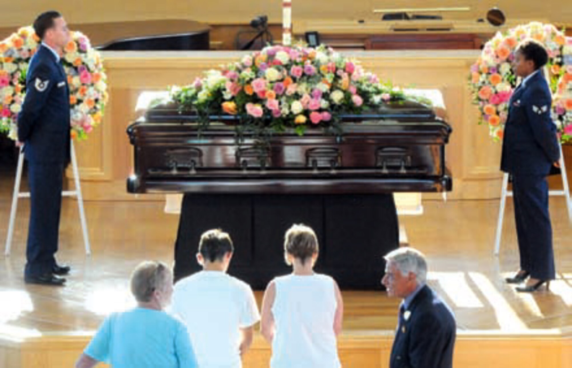 Tech. Sgt. Scott Crandell and Senior Airman Cully Hopkins, 163rd Reconnaissance Wing, guard former First Lady Elizabeth B. Ford’s casket during the repose where the public paid their respects at Saint Margaret’s Episcopal Church, July 12. (U.S. Air Force photo / Master Sgt. Julie Avey)