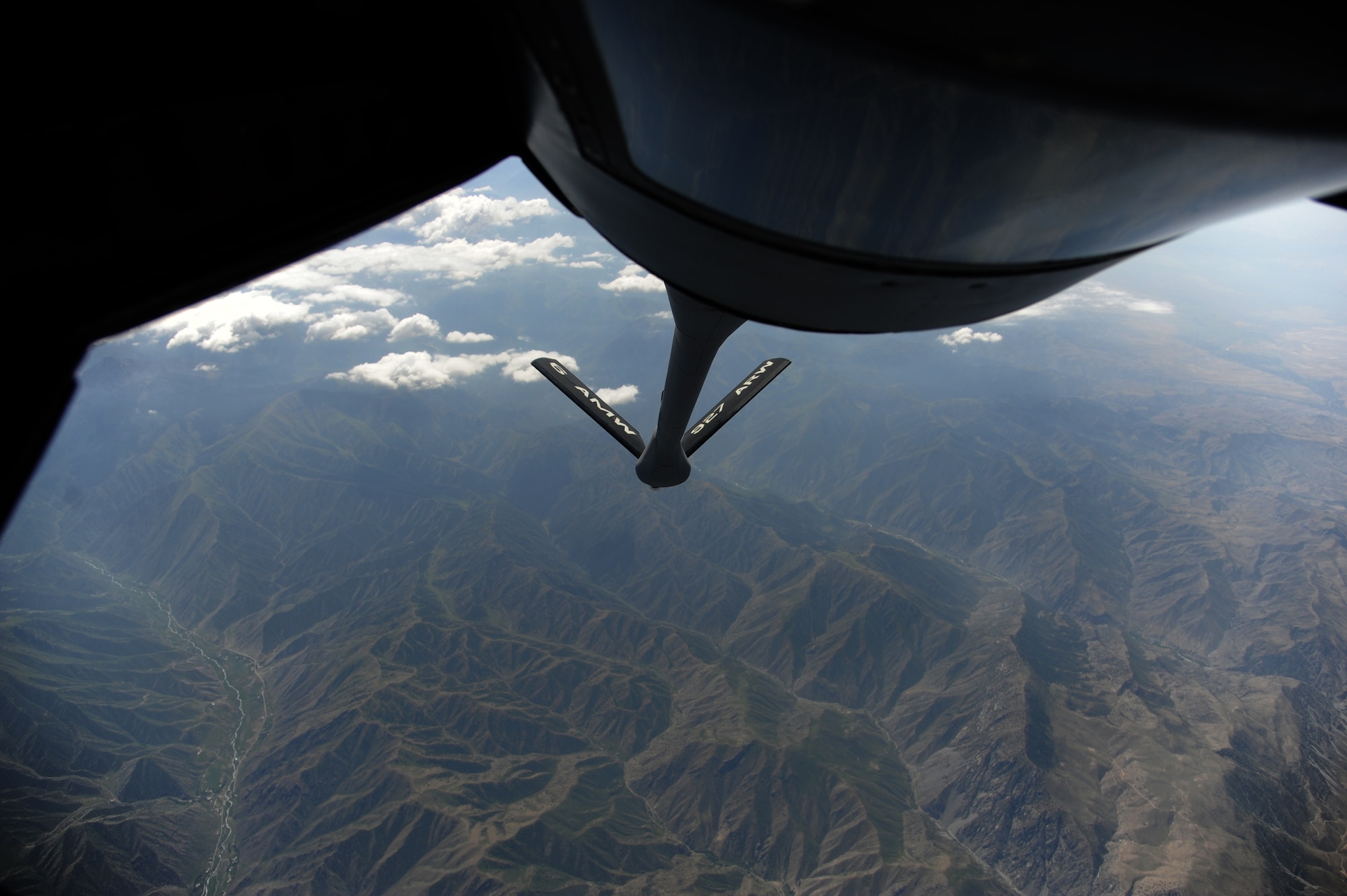 A 22nd Expeditionary Air Refueling Squadron aircrew pilots a KC-135 Stratotanker over a Kyrgyzstan mountain range July 22. The Transit Center at Manas’ KC-135s provide aerial refueling to aircraft supporting Operation Enduring Freedom. This aircrew and KC-135 are deployed to the Transit Center from the 93rd Air Refueling Squadron at Fairchild Air Force Base, Wash. (U.S. Air Force photo/Tech. Sgt. Hank Hoegen)