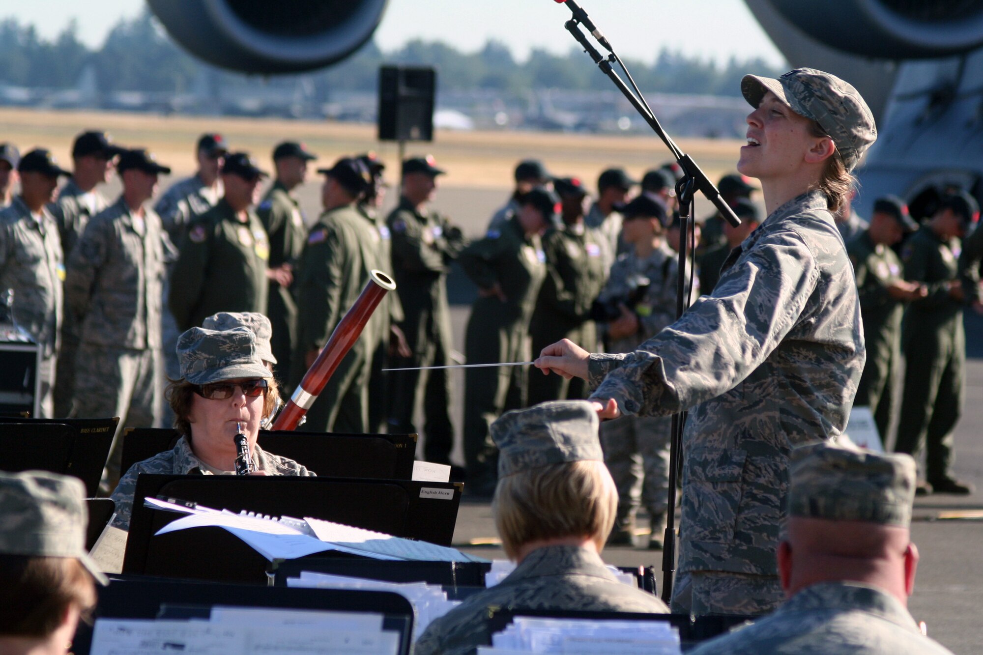 Members of the Band of the Golden West of Travis Air Force Base, Calif., play music at the beginning of opening ceremonies for Air Mobility Rodeo 2011 on July 24, 2011, at Joint Base Lewis-McChord, Wash. Air Mobility Rodeo 2011, sponsored by the Air Mobility Command, is the Mobility Air Force's readiness competition. This competition focuses on improving worldwide air mobility forces' professional core abilities. More than 150 teams and 3,000 people from the Air Force, and Air Force Reserve, as well as allied nations are participating in Rodeo. (U.S. Air Force Photo/Master Sgt. Scott T. Sturkol)