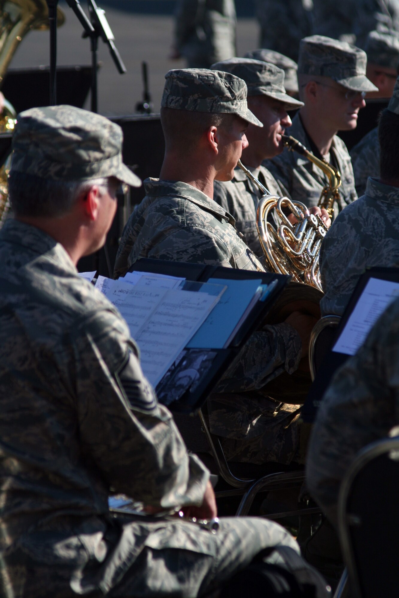 Members of the Band of the Golden West of Travis Air Force Base, Calif., play music at the beginning of opening ceremonies for Air Mobility Rodeo 2011 on July 24, 2011, at Joint Base Lewis-McChord, Wash. Air Mobility Rodeo 2011, sponsored by the Air Mobility Command, is the Mobility Air Force's readiness competition. This competition focuses on improving worldwide air mobility forces' professional core abilities. More than 150 teams and 3,000 people from the Air Force, and Air Force Reserve, as well as allied nations are participating in Rodeo. (U.S. Air Force Photo/Master Sgt. Scott T. Sturkol)