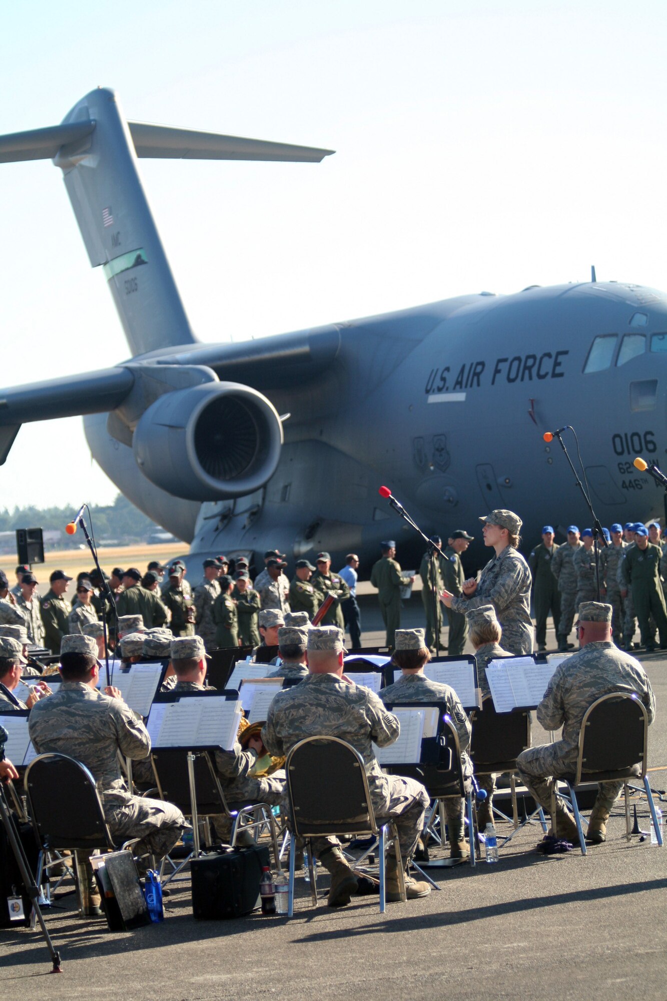 Members of the Band of the Golden West of Travis Air Force Base, Calif., play music at the beginning of opening ceremonies for Air Mobility Rodeo 2011 on July 24, 2011, at Joint Base Lewis-McChord, Wash. Air Mobility Rodeo 2011, sponsored by the Air Mobility Command, is the Mobility Air Force's readiness competition. This competition focuses on improving worldwide air mobility forces' professional core abilities. More than 150 teams and 3,000 people from the Air Force, and Air Force Reserve, as well as allied nations are participating in Rodeo. (U.S. Air Force Photo/Master Sgt. Scott T. Sturkol)