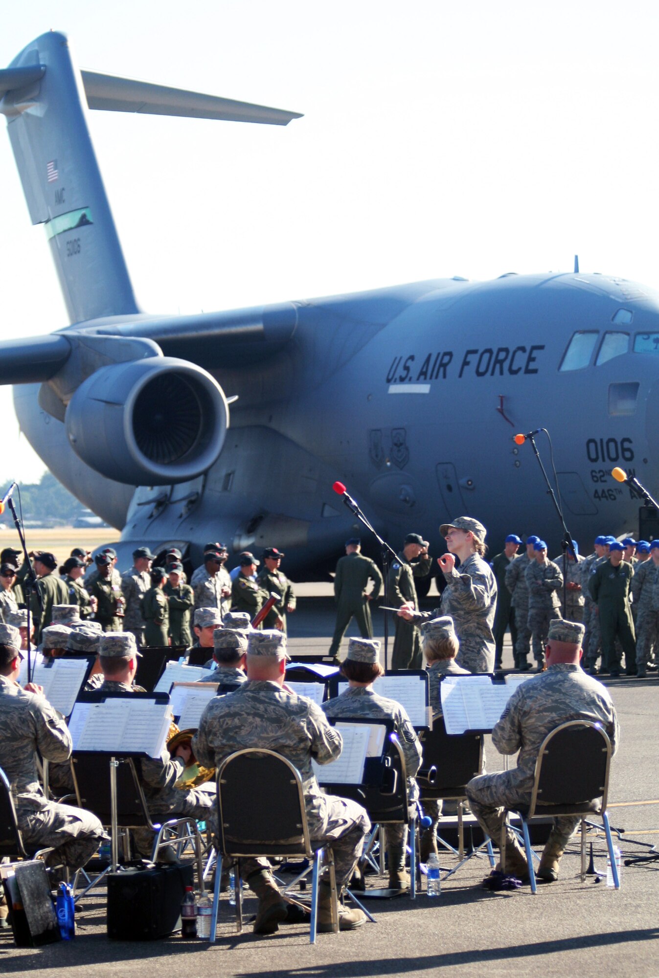 Members of the Band of the Golden West of Travis Air Force Base, Calif., play music at the beginning of opening ceremonies for Air Mobility Rodeo 2011 on July 24, 2011, at Joint Base Lewis-McChord, Wash. Air Mobility Rodeo 2011, sponsored by the Air Mobility Command, is the Mobility Air Force's readiness competition. This competition focuses on improving worldwide air mobility forces' professional core abilities. More than 150 teams and 3,000 people from the Air Force, and Air Force Reserve, as well as allied nations are participating in Rodeo. (U.S. Air Force Photo/Master Sgt. Scott T. Sturkol)