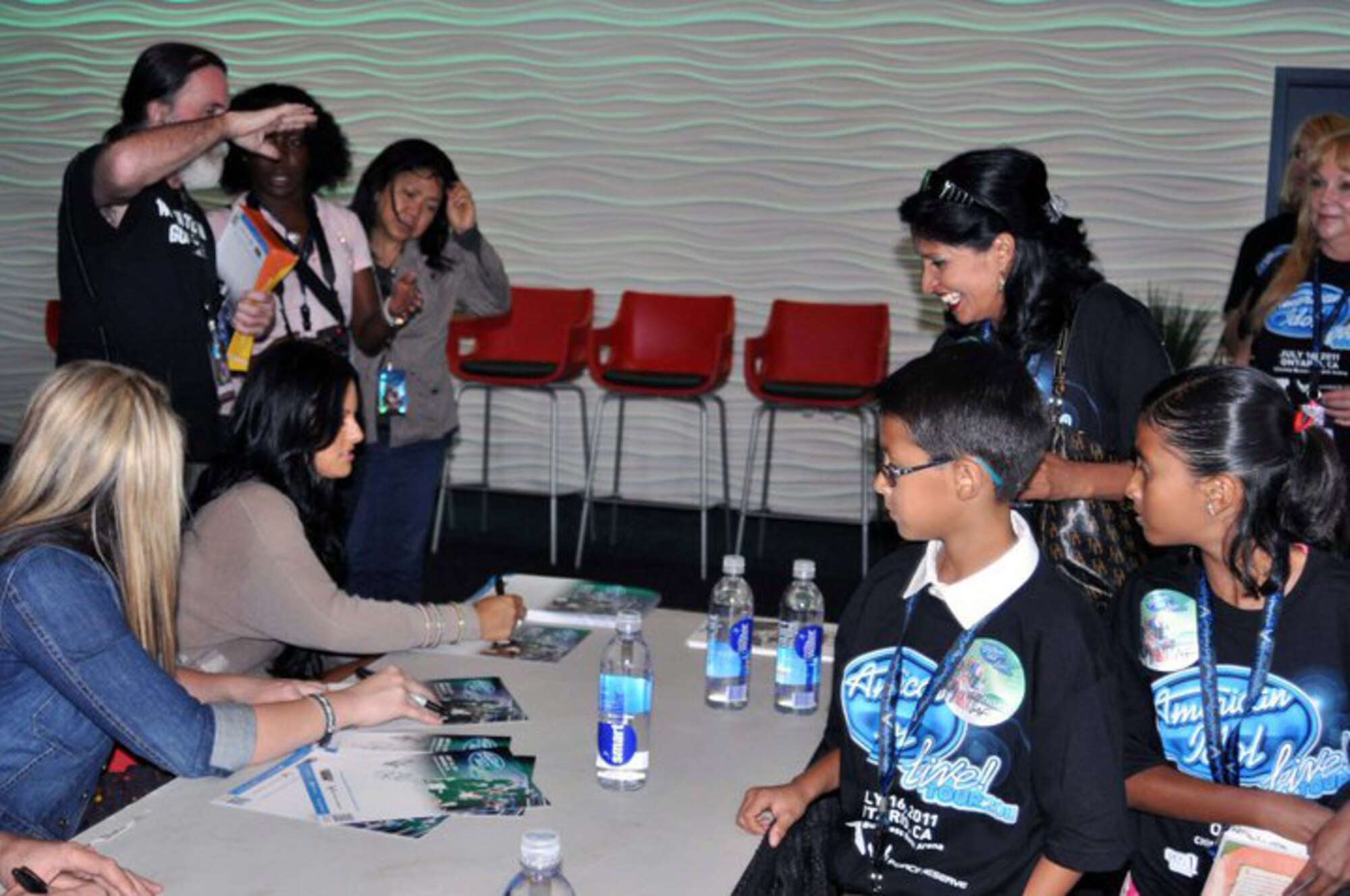 The U.S. Air Force Reserve GetOneNow program is the reason these March Air Reserve Base reservists and their guests attended the 2011 American Idol Live Tour July 16th in Ontario, Calif. The VIP concert tickets included the meet and greet with the idols. (U.S. Air Force photo/Linda Welz)