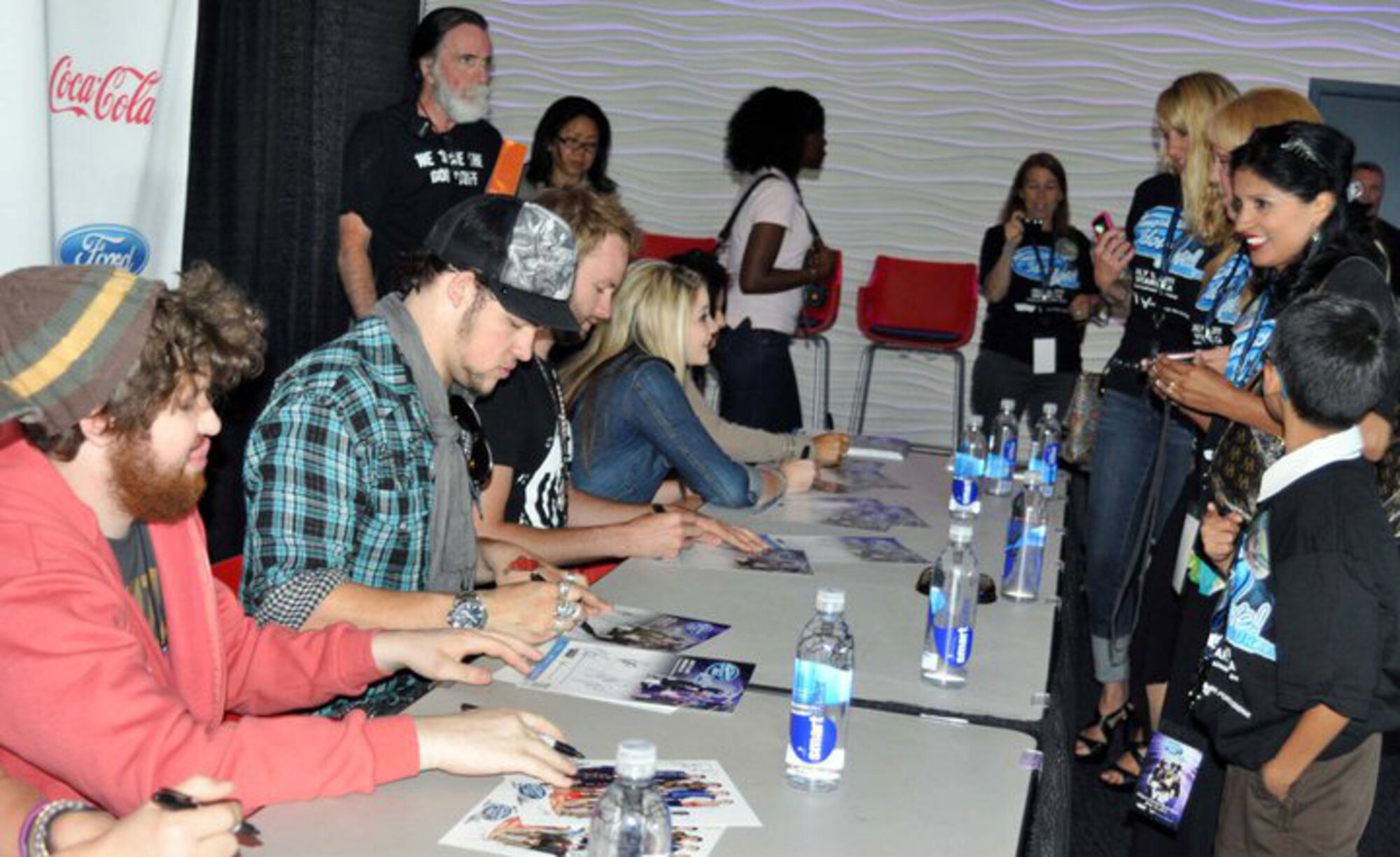 The U.S. Air Force Reserve GetOneNow program is the reason these March Air Reserve Base reservists and their guests attended the 2011 American Idol Live Tour July 16th in Ontario, Calif. The VIP concert tickets included the meet and greet with the idols. (U.S. Air Force photo/Linda Welz)