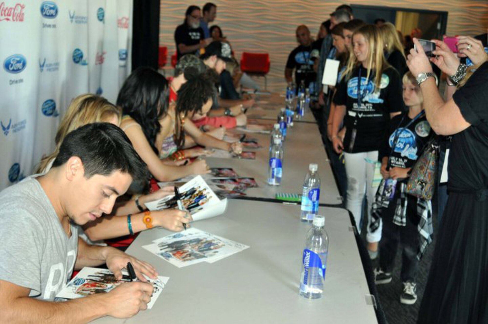 The U.S. Air Force Reserve GetOneNow program is the reason these March Air Reserve Base reservists and their guests attended the 2011 American Idol Live Tour July 16th in Ontario, Calif. The VIP concert tickets included the meet and greet with the idols. (U.S. Air Force photo/Linda Welz)