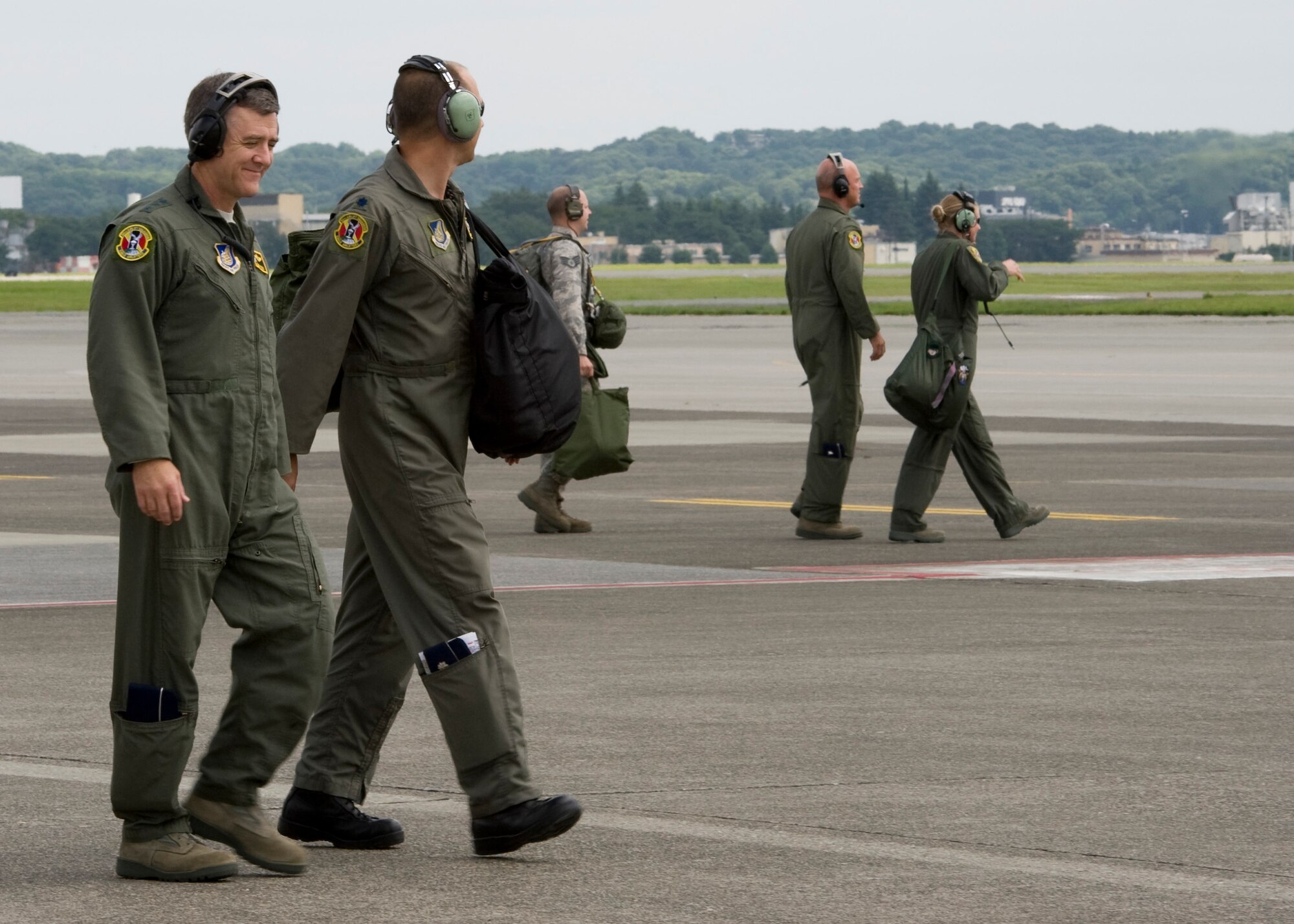 YOKOTA AIR BASE, Japan -- Lt. Gen. Burton Field (left), U.S. Forces, Japan, and 5th Air Force commander, and Lt. Col. Mark Leavitt, 374th Operations Group evaluation flight chief, walk on the flightline at Yokota Air Base, Japan, July 22, 2011. (U.S. Air Force photo/Senior Airman Andrea Salazar)