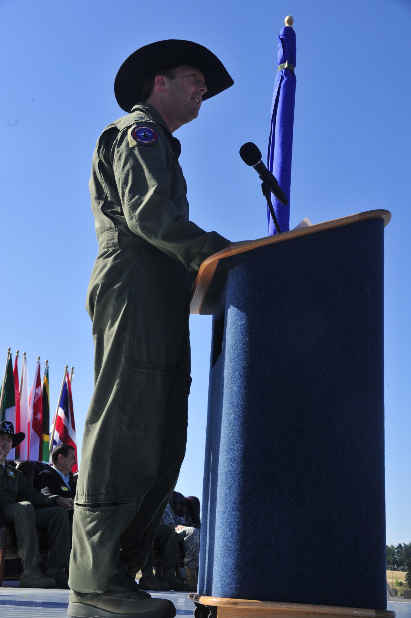 Col. R. Wyn Elder, 62nd Airlift Wing commander, speaks during the opening
ceremony for Air Mobility Command's 2011 Rodeo July 24 at Joint Base
Lewis-McChord, Wash. Colonel Elder welcomed all the attendees including
3,000 individuals from U.S. Air Force, Air Force Reserve, Air National
Guard, and more than 30 international teams. (U.S. Air Force Photo/Staff
Sgt. Frances Kriss)
