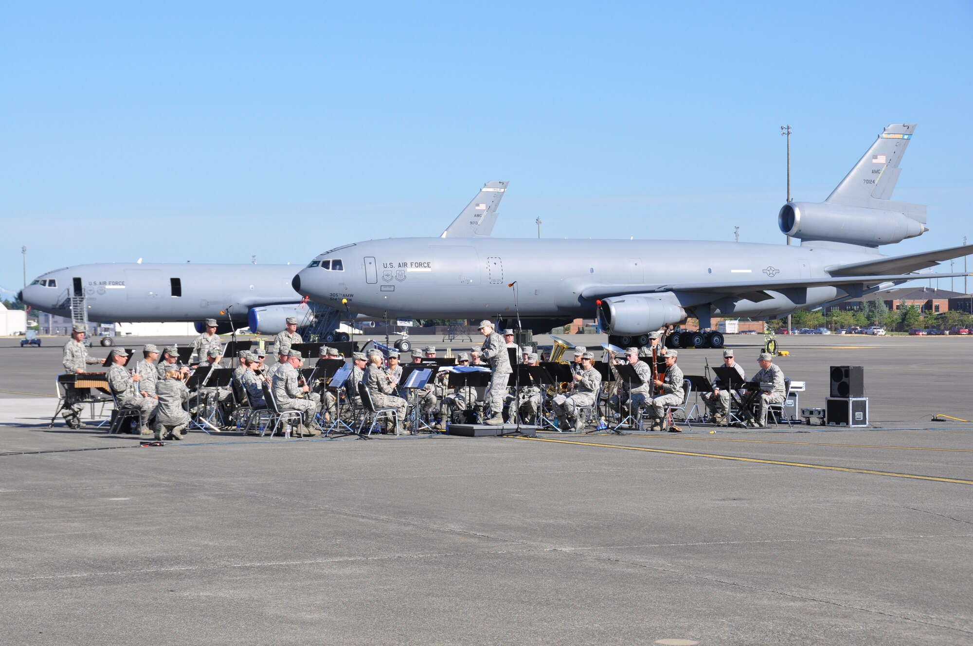 The United States Air Force Band of the Golden West performs July 24, 2011 at the opening ceremonies for the Air Mobility Rodeo 2011 at Joint Base Lewis-McChord, Wash. Air Mobility Rodeo 2011 is a biennial international competition that focuses on mission readiness, featuring airdrops, aerial refueling and other events that showcase the skills of mobility crews from around the world. (U.S. Air Force photo/ Airman 1st Class Michael Battles)