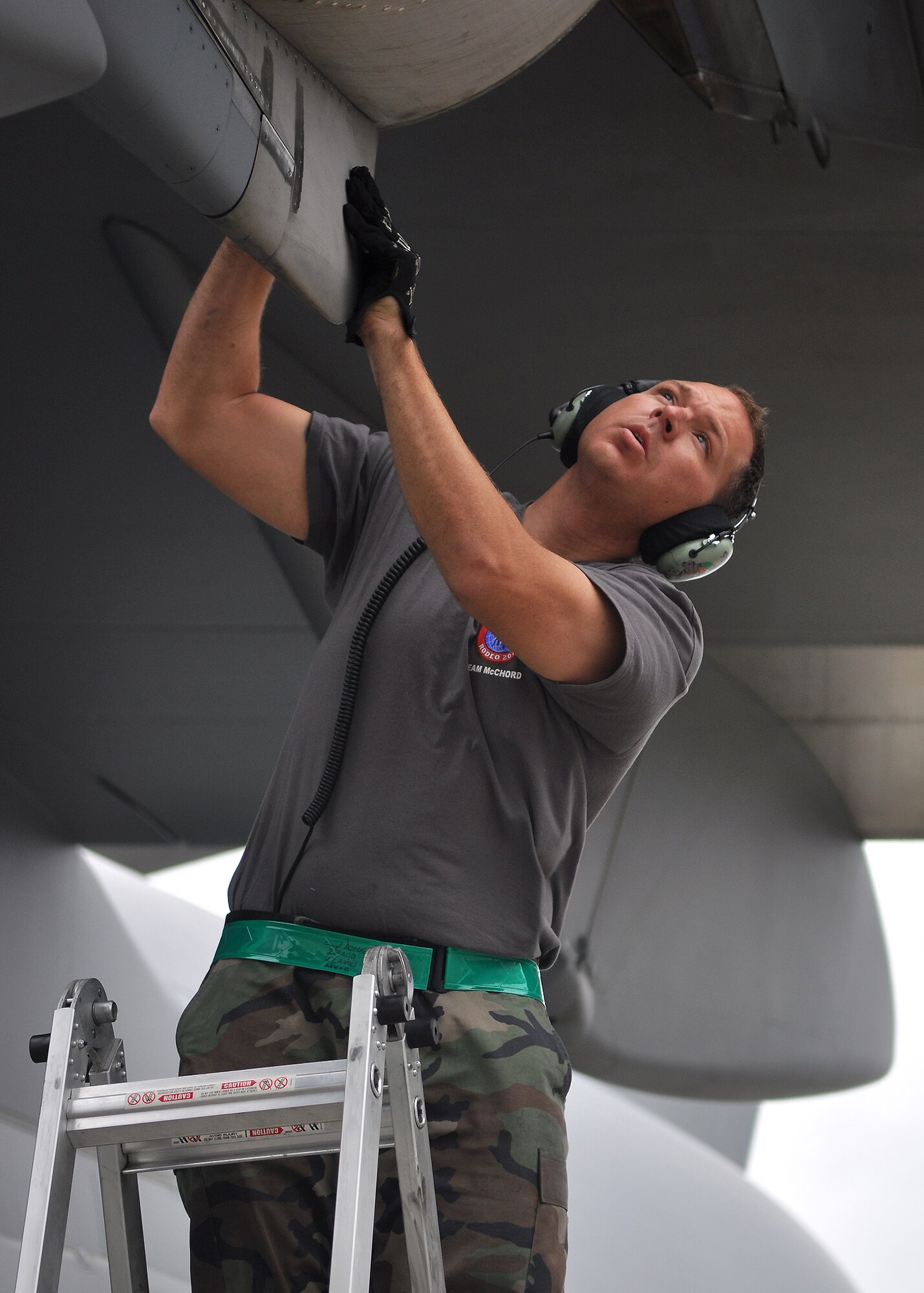 Tech. Sgt. Justin Dancer, 62nd Aircraft Maintenance Squadron Rodeo team member, conducts a C-17 Globemaster III foreign object inspection July 21 at Joint Base Lewis-McChord, Wash. Sergeant Dancer and his teammates have been preparing the C-17 for two months, fixing every minor discrepancy and eliminating all foreign object debris. They will compete in Air Mobility Rodeo 2011, sponsored by the Air Mobility Command, which is the Mobility Air Force's premier readiness competition. This competition focuses on improving our worldwide air mobility forces' professional core abilities. (U.S. Air Force photo/Airman 1st Class Leah Young)