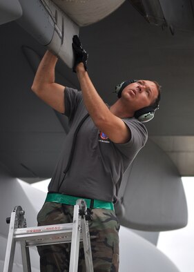 Tech. Sgt. Justin Dancer, 62nd Aircraft Maintenance Squadron Rodeo team member, conducts a C-17 Globemaster III foreign object inspection July 21, 2011, at Joint Base Lewis-McChord, Wash. Sergeant Dancer and his teammates have been preparing the C-17 for two months, fixing every minor discrepancy and eliminating all foreign object debris. They will compete in Air Mobility Rodeo 2011, sponsored by the Air Mobility Command, which is the Mobility Air Force's premier readiness competition. This competition focuses on improving our worldwide air mobility forces' professional core abilities. (U.S. Air Force photo/Airman 1st Class Leah Young) 