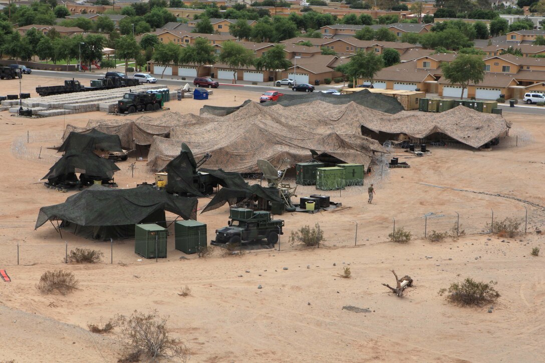 Marine tactical air command squadron 48 Marines operate out of a complete tactical air command center for Operation Javelin Thrust 2011 at Marine Corps Air Station Yuma, Ariz., July 23. The TACC receives and distributes information between the operating forces to facilitate communication during the exercise. The reserve Marines set up, organized and operated an independent reserve TACC for the first time, setting the tone for an operation reserve force in future deployed environments.
