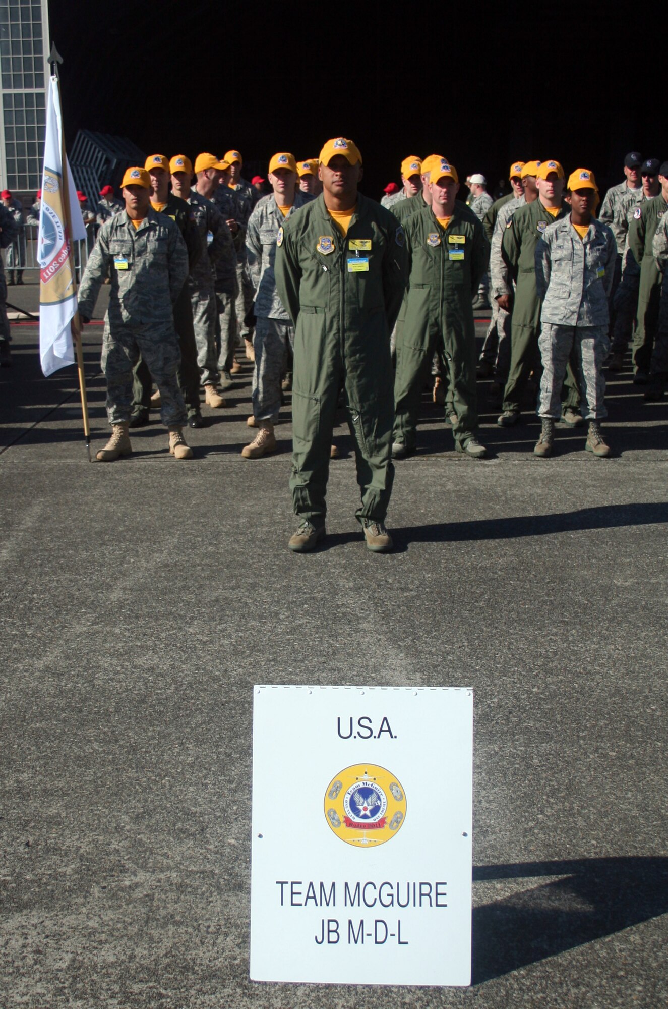Participants for Air Mobility Rodeo 2011 are shown in formation for opening ceremonies for Rodeo on July 24, 2011, at Joint Base Lewis-McChord, Wash.  Rodeo 2011, sponsored by the Air Mobility Command, is the Mobility Air Force's readiness competition. This competition focuses on improving worldwide air mobility forces' professional core abilities. More than 150 teams and 3,000 people from the Air Force, and Air Force Reserve, as well as allied nations are participating in Rodeo. (U.S. Air Force Photo/Master Sgt. Scott T. Sturkol)