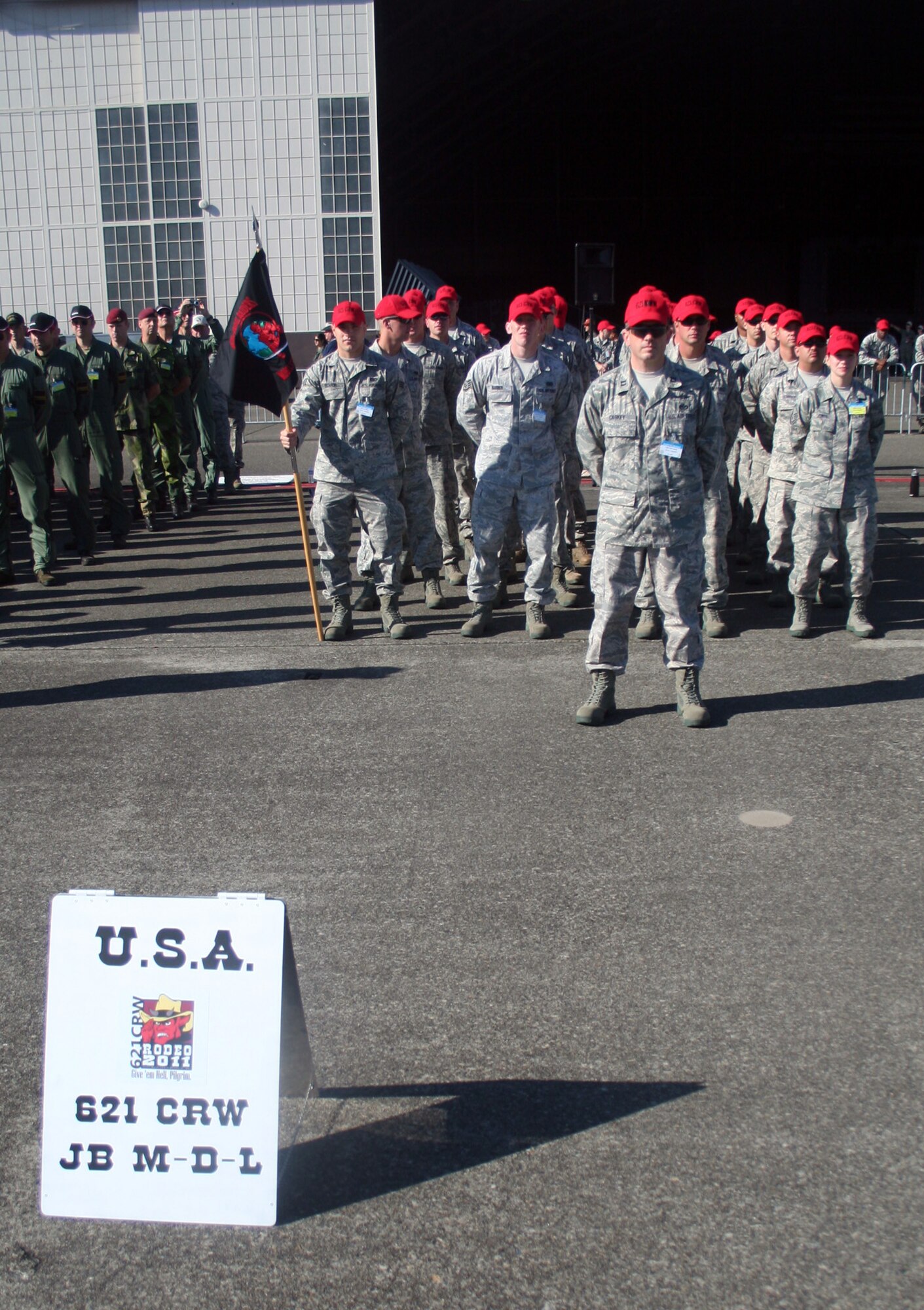 Participants for Air Mobility Rodeo 2011 are shown in formation for opening ceremonies for Rodeo on July 24, 2011, at Joint Base Lewis-McChord, Wash.  Rodeo 2011, sponsored by the Air Mobility Command, is the Mobility Air Force's readiness competition. This competition focuses on improving worldwide air mobility forces' professional core abilities. More than 150 teams and 3,000 people from the Air Force, and Air Force Reserve, as well as allied nations are participating in Rodeo. (U.S. Air Force Photo/Master Sgt. Scott T. Sturkol)