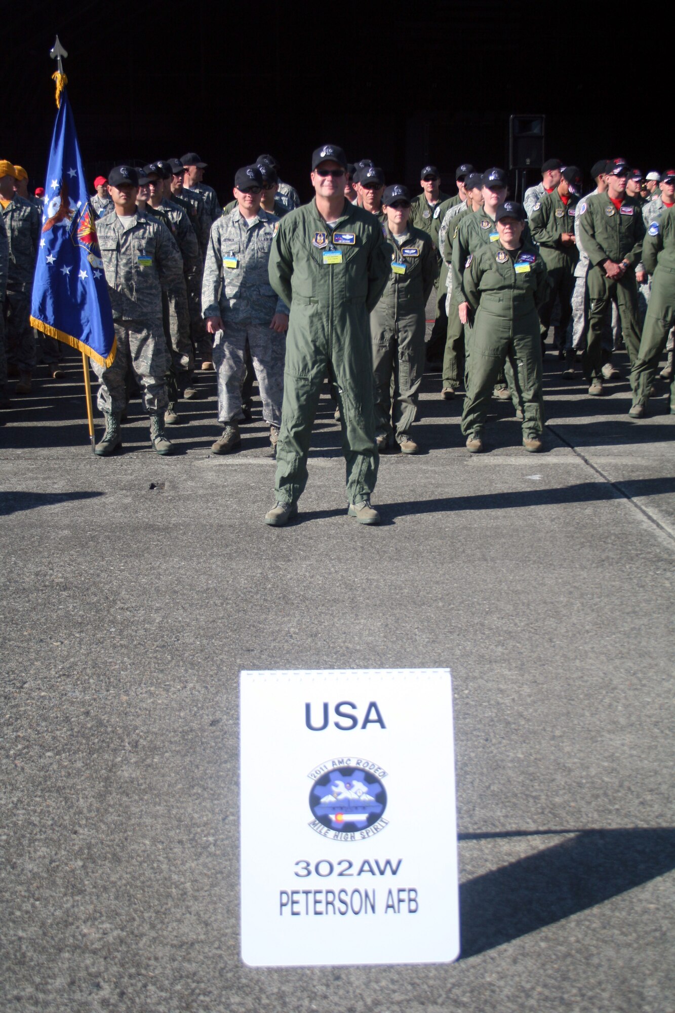 Participants for Air Mobility Rodeo 2011 are shown in formation for opening ceremonies for Rodeo on July 24, 2011, at Joint Base Lewis-McChord, Wash.  Rodeo 2011, sponsored by the Air Mobility Command, is the Mobility Air Force's readiness competition. This competition focuses on improving worldwide air mobility forces' professional core abilities. More than 150 teams and 3,000 people from the Air Force, and Air Force Reserve, as well as allied nations are participating in Rodeo. (U.S. Air Force Photo/Master Sgt. Scott T. Sturkol)
