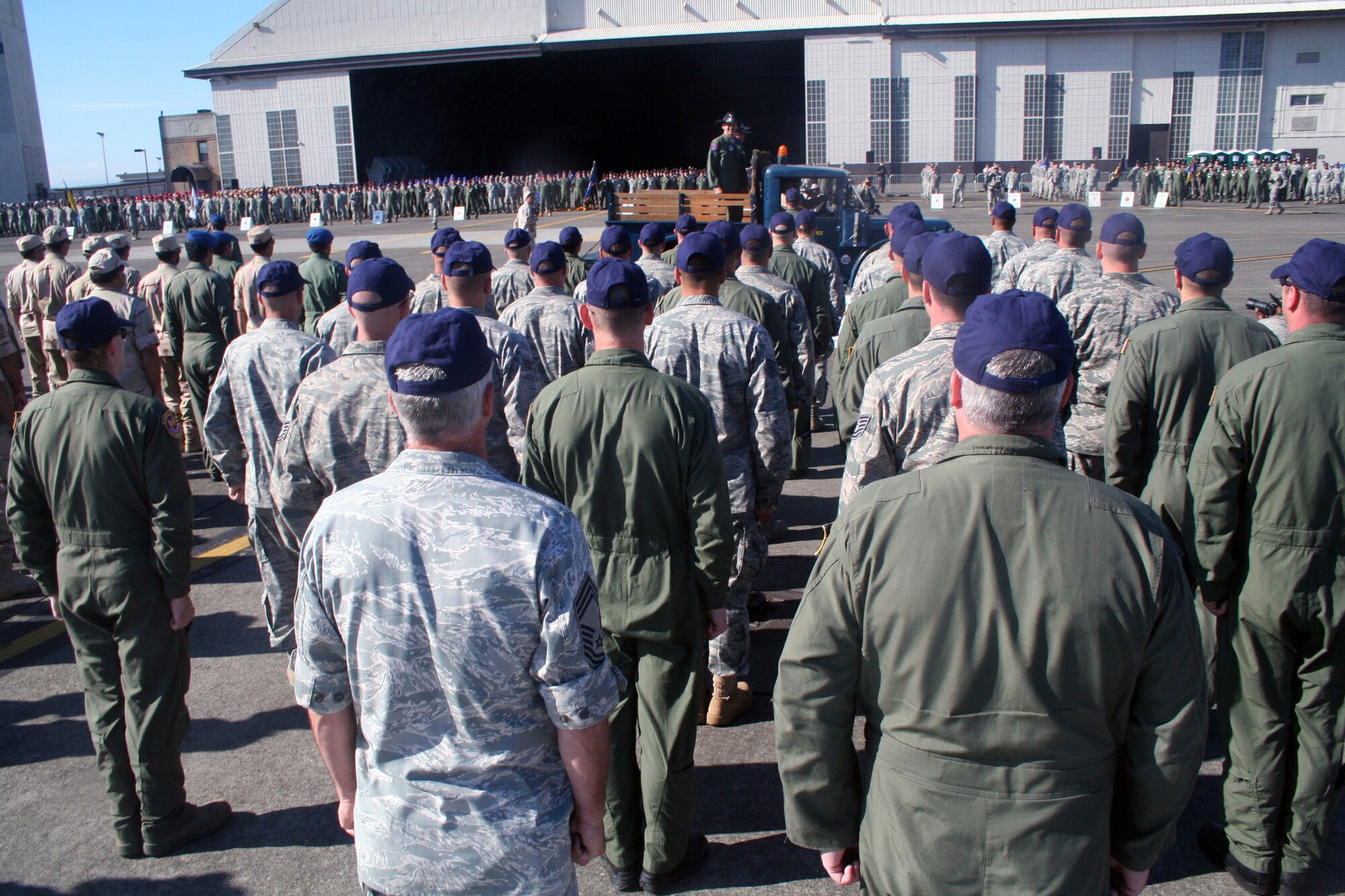 Gen. Raymond E. Johns Jr., Air Mobility Command commander, and Brig. Gen. Rick Martin, Rodeo commander, participate in a pass and review during opening ceremonies for Air Mobility Rodeo 2011 at Joint Base Lewis-McChord, Wash., on July 24, 2011. (U.S. Air Force Photo/Master Sgt. Scott T. Sturkol)