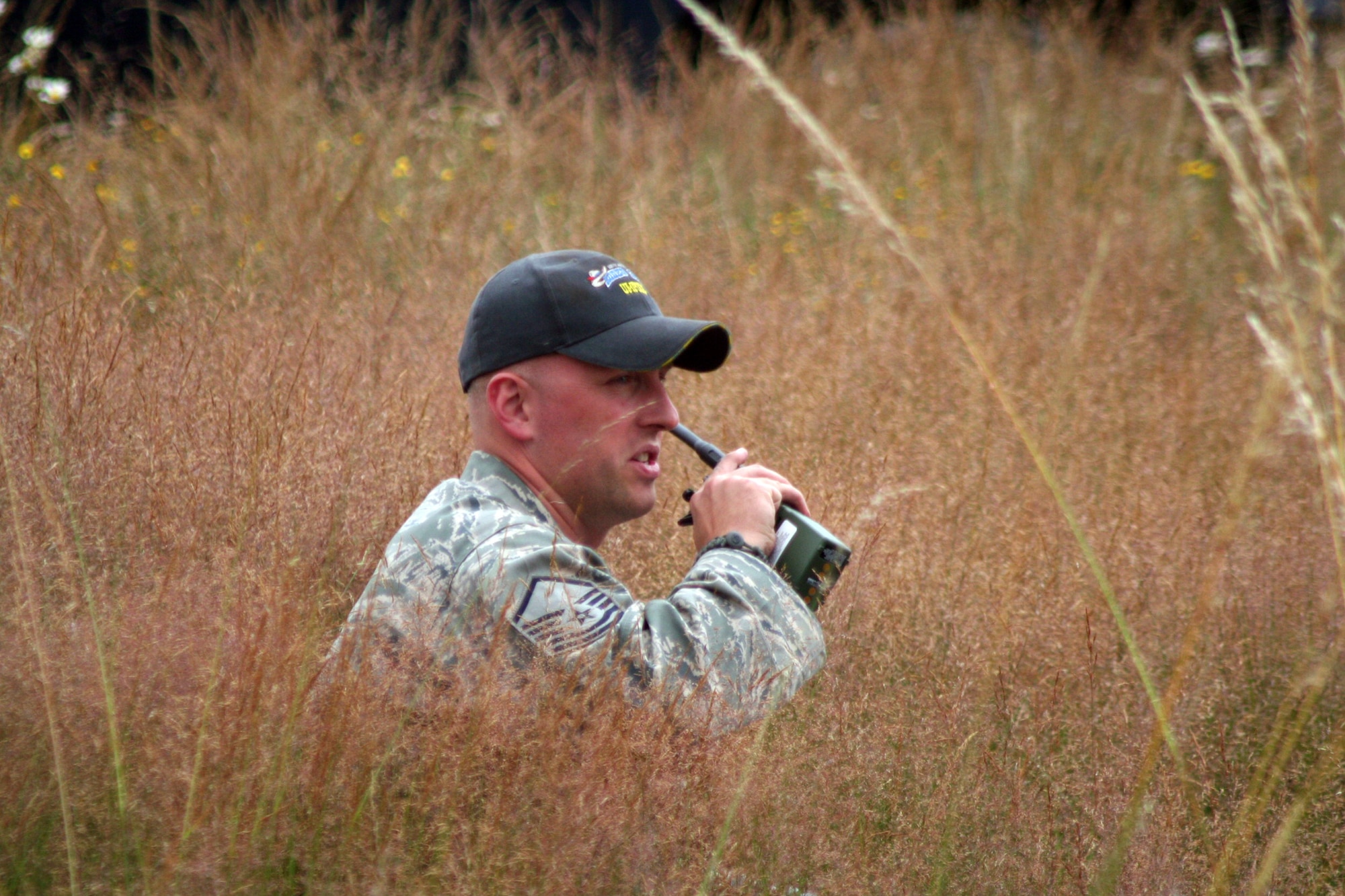 Master Sgt. Bill Gaskins, Air Mobility Rodeo 2011 umpire and superintendent for security forces training at the 421st Combat Training Squadron at the U.S. Air Force Expeditionary Center on Joint Base McGuire-Dix-Lakehurst, N.J., watches over the Rodeo security forces combat tactics event at Joint Base Lewis-McChord, Wash., on July 25, 2011. (U.S. Air Force Photo/Master Sgt. Scott T. Sturkol)