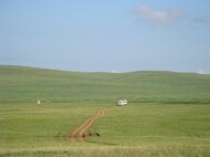 In support of the first Pacific Angel in Mongolia, each morning vans depart from ger base camp with 130 Mongolian, U.S., and Sri Lankan military medical providers, engineers, and support staff, along with Project Hope and interpreters, for one to two-hour bumpy dirt road rides to medical, dental, optometry, veterinary and engineering sites in Delgerkhaan, Jargaltkhaan, and Tsenkhermandal and Ondorkhaan in Hentii province from July 18-23, 2011. Pacific Angels cultivate bonds and foster goodwill between the U.S. and Asian-Pacific countries through capacity-building in humanitarian assistance. In its fourth year, Pacific Angels are planned and executed by at 13th Air Force at Joint Base Pearl Harbor-Hickam, Hawaii.(Air Force photo/Lt. Col. Tracey Saiki)
