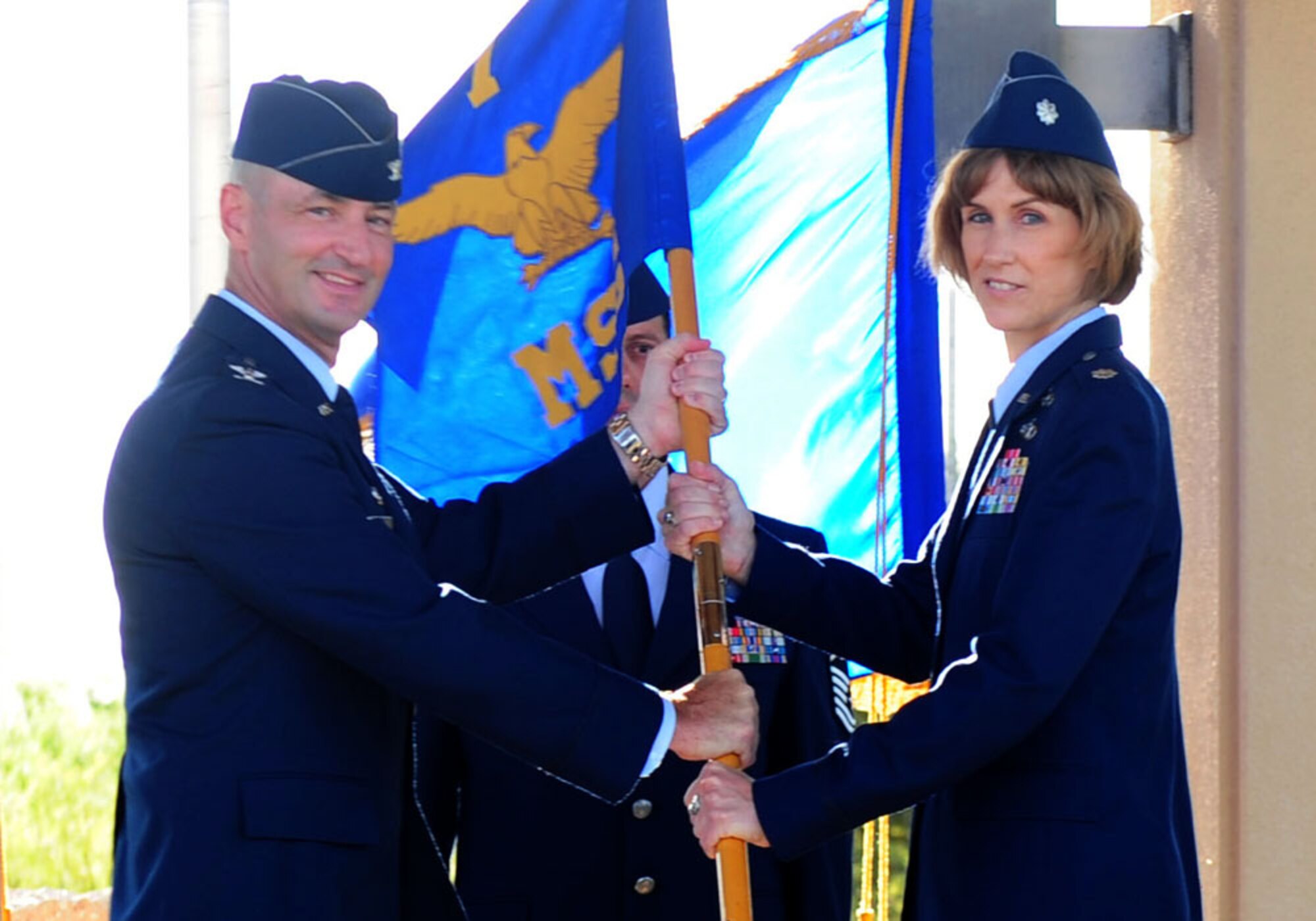 DYESS AIR FORCE BASE, Texas – Col. David Been, 7th Bomb Wing commander, officiates the 7th Mission Support Group change of command ceremony where Lt Col. Kristina O’Brien assumes command of the group at the parade grounds here, July 25. The change of command is a military ceremony in which the departing commander assembles his troops for presentation to the incoming commander. The ceremony serves to inform the assembled Airmen that they must respond to the leadership of the new commander. (U.S. Air Force photo by Senior Airman Chelsea Browning/Released)
