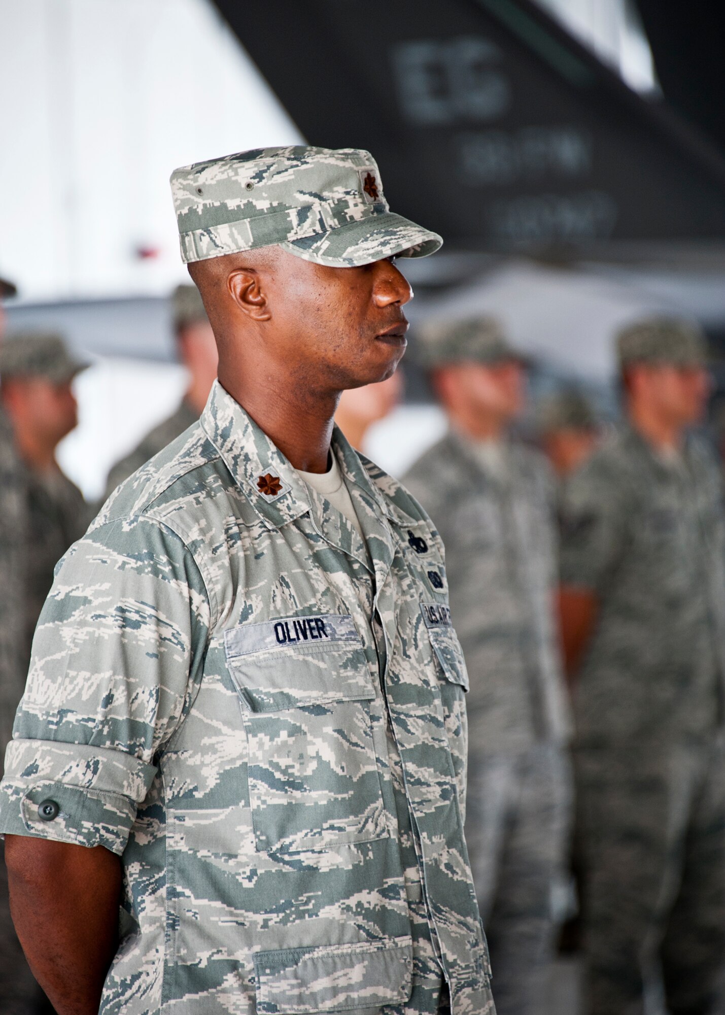 Maj. Steven Oliver, the 33rd Aircraft Maintenance Squadron commander, stands in front of his flight during the 33rd Maintenance Group change of command ceremony July 22 at Eglin Air Force Base, Fla.  Col. Mark Fluker took command of the group from Marine Col. Laura Sampsel.  (U.S. Air Force photo/Samuel King Jr.)