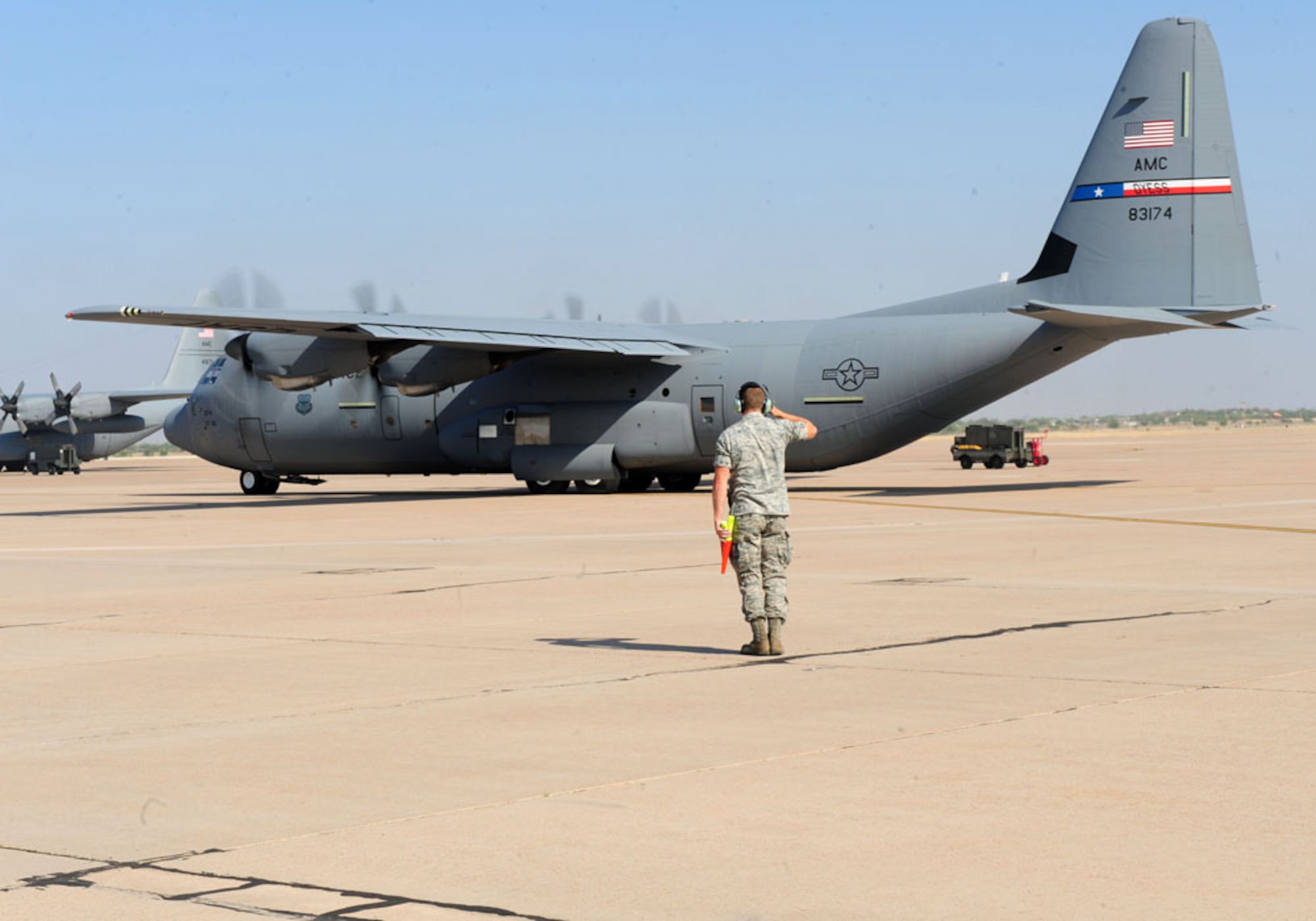 DYESS AIR FORCE BASE, Texas – A Dyess C-130J taxis to depart Dyess for the Air Mobility Command Rodeo at Joint Base Lewis-McChord, Wash., July 22. The AMC Rodeo is a biennial competition within the command. The international competition focuses on improving worldwide air mobility forces' professional core abilities. Competing in the rodeo are Airmen from the 317th Airlift Group, the 7th Security Forces Squadron and the 7th Logistics Readiness Squadron. (U.S. Air Force photo by Senior Airman Chelsea Browning/Released)