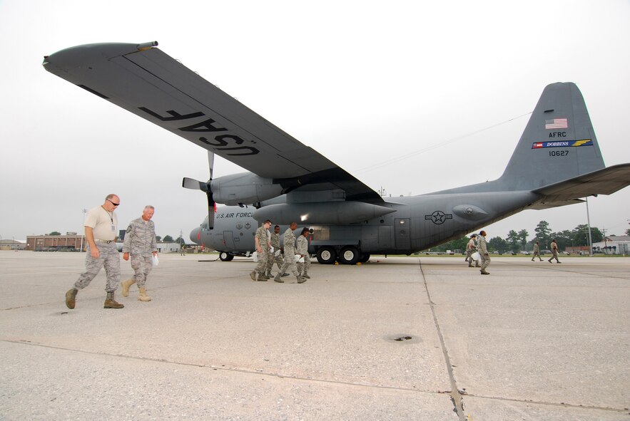 94th Maintenance Group personnel perform a FOD walk at Dobbins ARB, July 10.  (U.S. Air Force photo/ Brad Fallin)