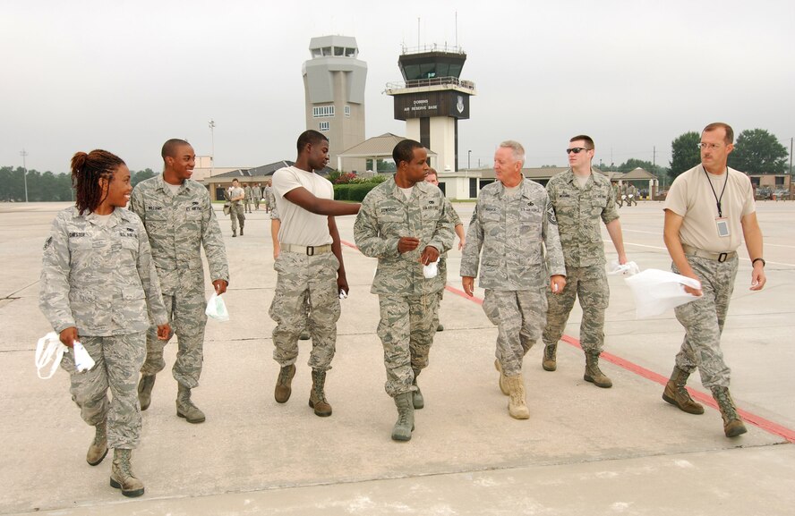 94th Maintenance Group personnel along with 94th Airlift Wing Command Chief, Chief Master Sgt. Wendell Peacock reposition for a return trip down the flight line during a FOD walk at Dobbins ARB, July 10.  (U.S. Air Force photo/ Brad Fallin)