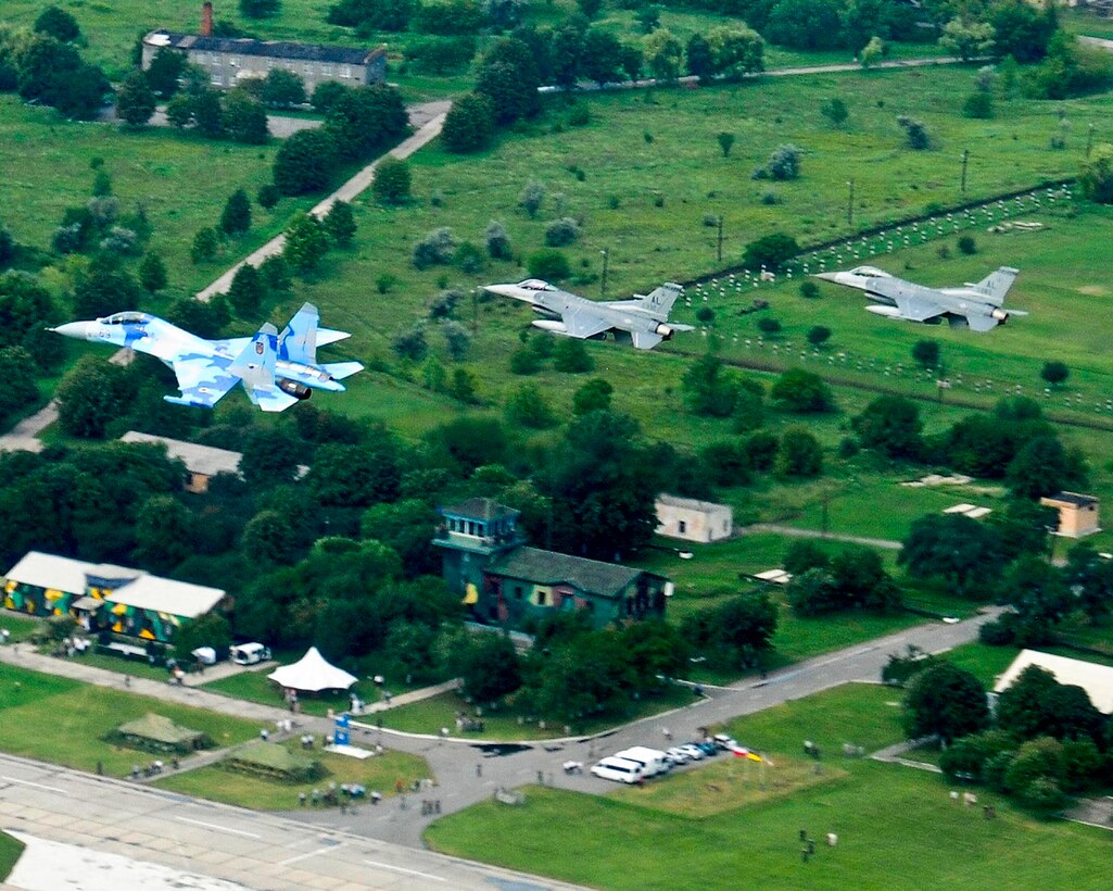 Air National Guard F-16C Fighting Falcons fly in formation with a Ukrainian SU-27 over Mirgorod Air Base, Ukraine, July 22, during  Safe Skies 2011. (U.S. Air Force photo/Tech. Sgt. Charles Vaughn)