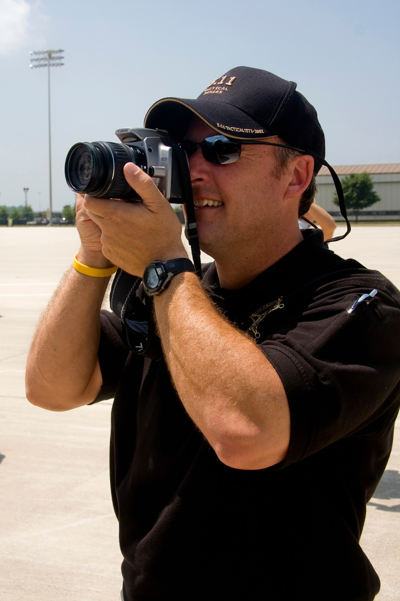 GRISSOM AIR RESERVE BASE, Ind. -- Mark Bowen, Hamilton County Sherriff, snaps off a couple shots of an engine on one of Grissom's KC-135R Stratotankers after returning from an orientation flight July 20. During the flight, the civic leaders, which represented a number of areas including Fort Wayne, Peru, Converse, Denver and Kokomo, were able to witness first-hand the mission of the 434th Air Refueling Wing as the crew refueled an E-3 Sentry from Tinker Air Force Base, Okla. Orientation flights are just one part of the 434th ARW's community outreach program. (U.S. Air Force photo/Tech. Sgt. Mark R. W. Orders-Woempner)
