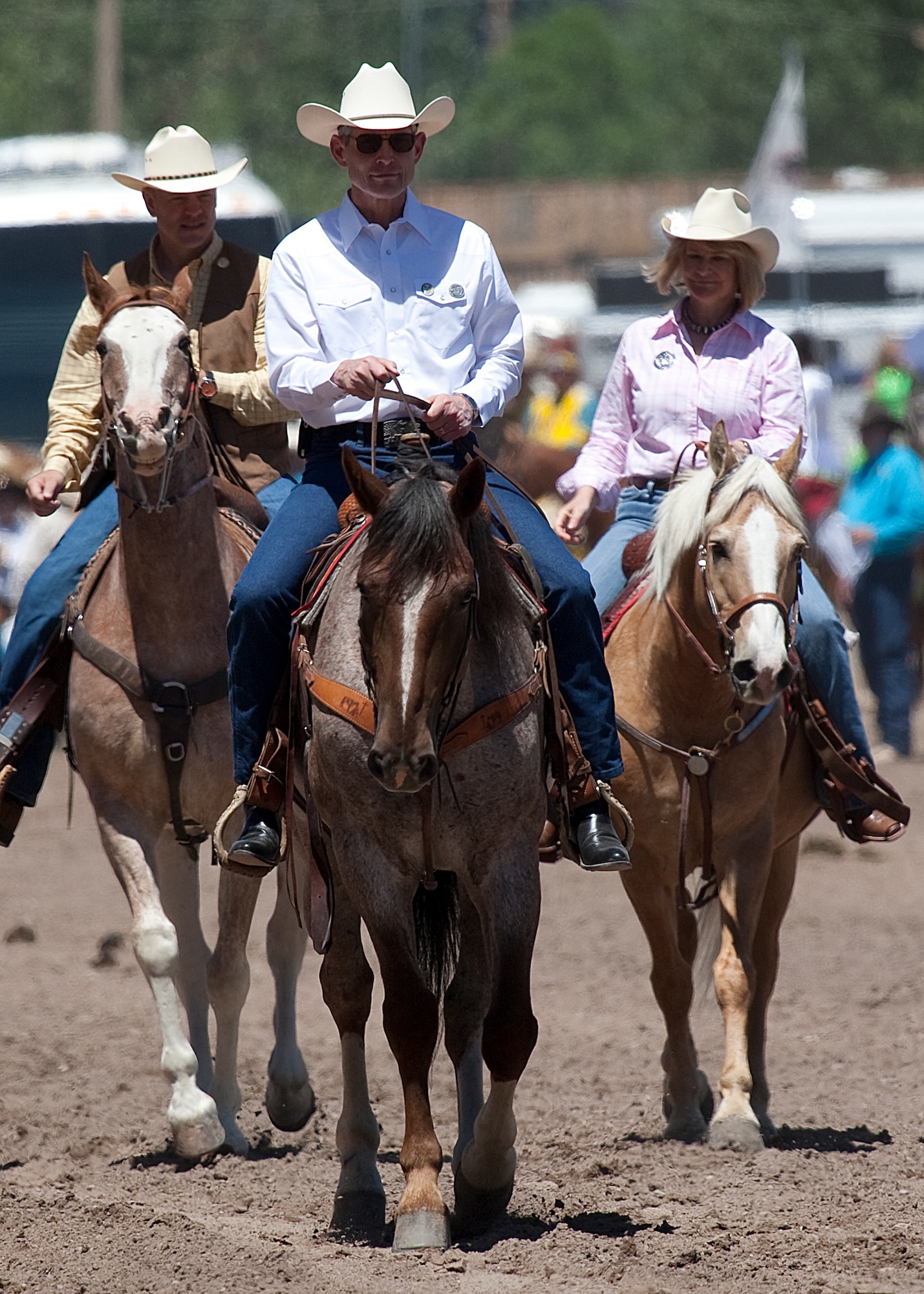 Air Force Chief of Staff Gen. Norton Schwartz rides with Rep. Cynthia Lummis and Wyoming Gov. Matt Mead July 23, 2011, at the 115th “Daddy of ‘Em All” rodeo grand entry at Frontier Park. Schwartz was the Cheyenne Frontier Days parade Grand Marshal. (U.S. Air Force photo/Matt Bilden)