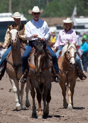 Air Force Chief of Staff Gen. Norton Schwartz rides with Rep. Cynthia Lummis and Wyoming Gov. Matt Mead July 23, 2011, at the 115th “Daddy of ‘Em All” rodeo grand entry at Frontier Park. Schwartz was the Cheyenne Frontier Days parade Grand Marshal. (U.S. Air Force photo/Matt Bilden)