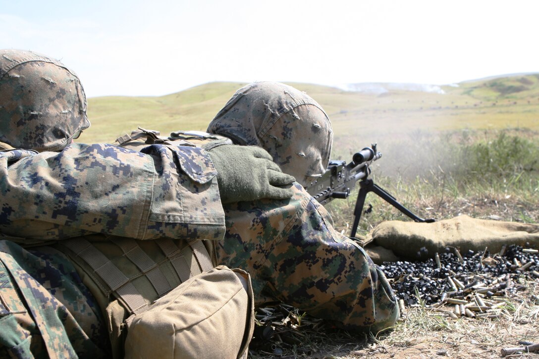 A machine gunner from Machine Gun Platoon, Support Company, Anti-Terrorism Battalion, 4th Marine Division, fires the M240B machine gun here July 25 during Exercise Agile Spirit 2011.  Agile Spirit is designed to increase interoperability between Marines and the Georgian Armed Forces by exchanging and enhancing each other’s capacity in counterinsurgency and peacekeeping operations, including: small unit tactics, convoy operations, and counter-Improvised Explosive Device training.